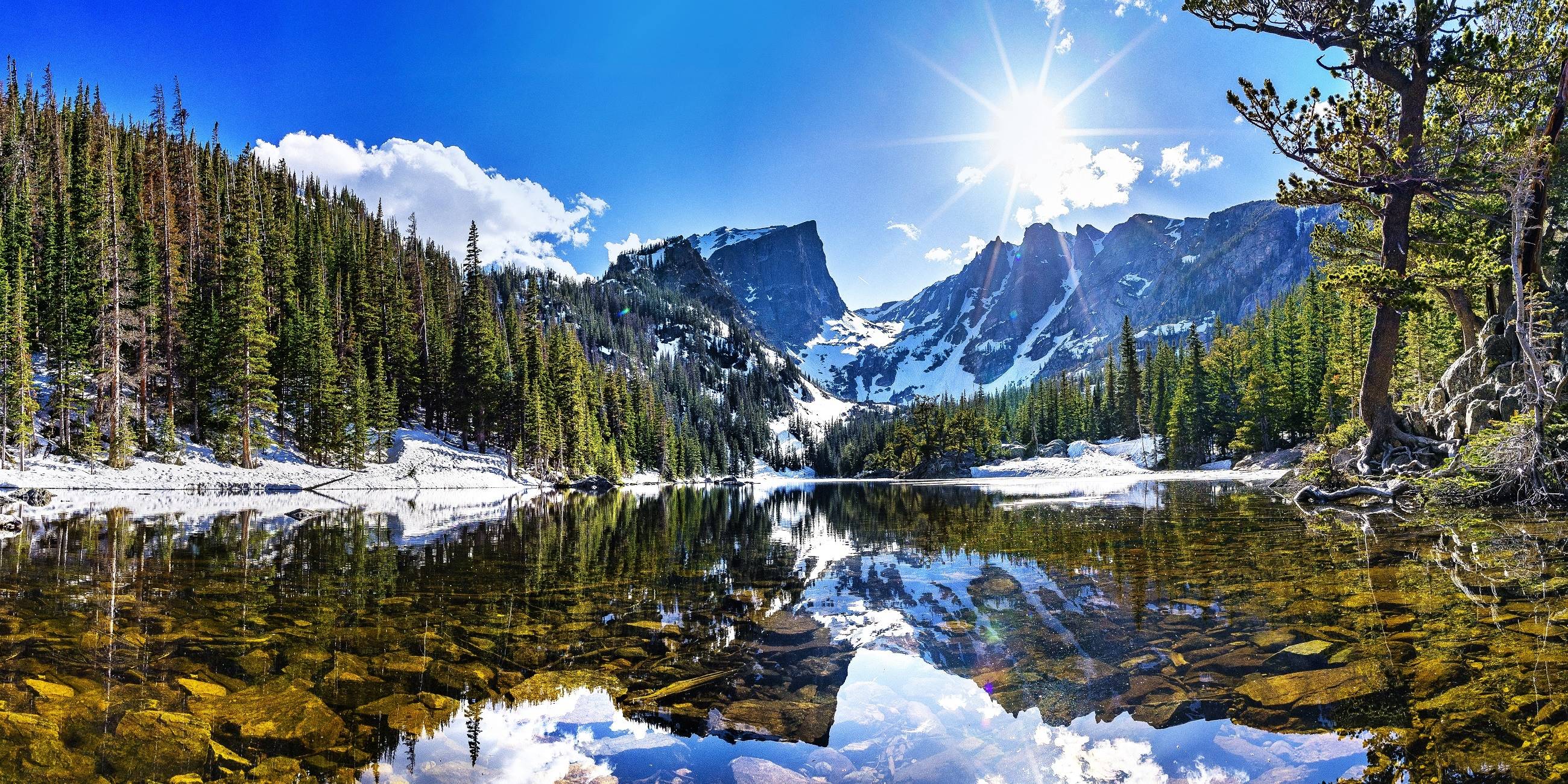 Rocky Mountains lake reflection with snow-capped peaks HD Wallpaper