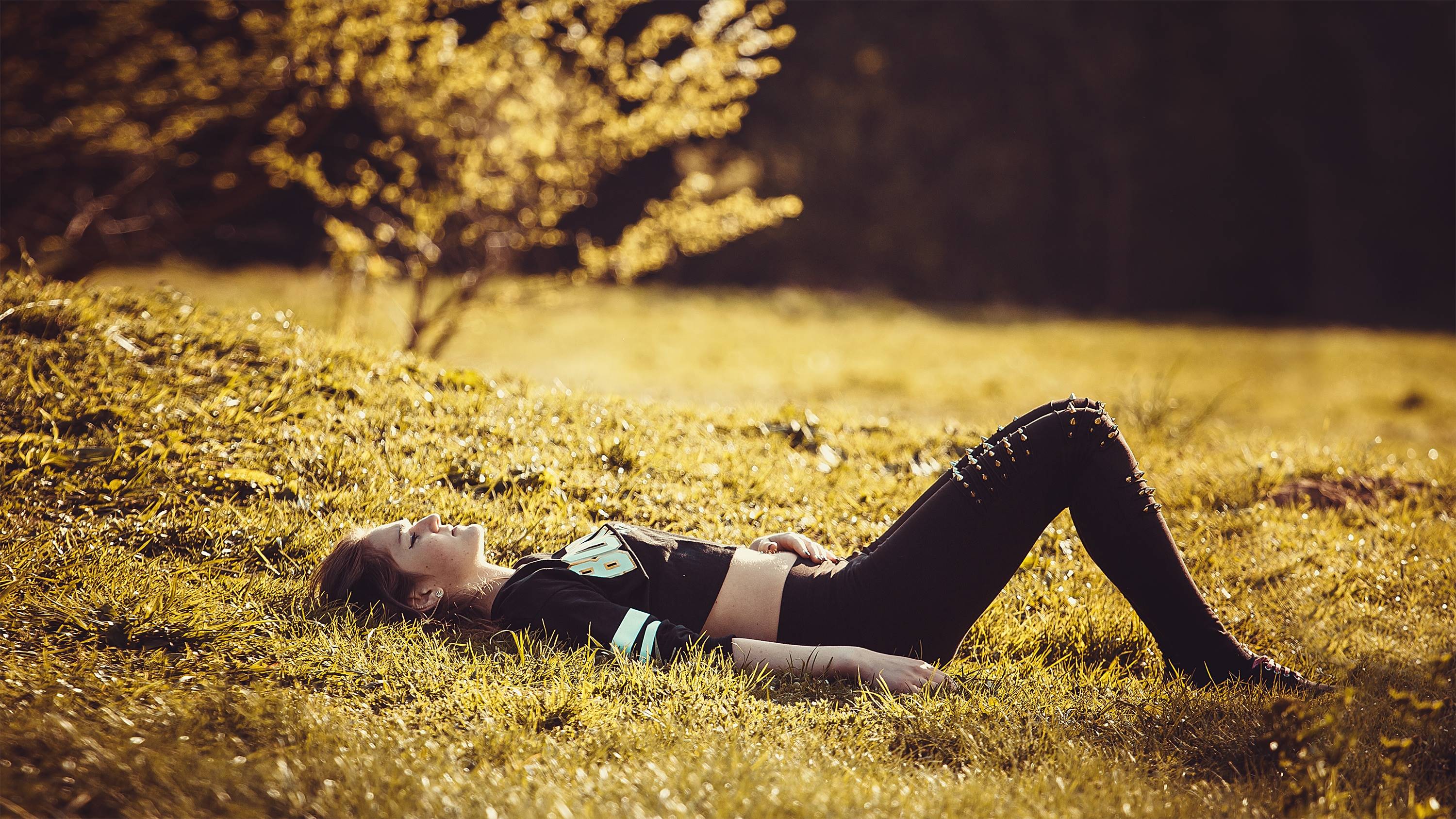 Woman lying on grass in nature HD Wallpaper