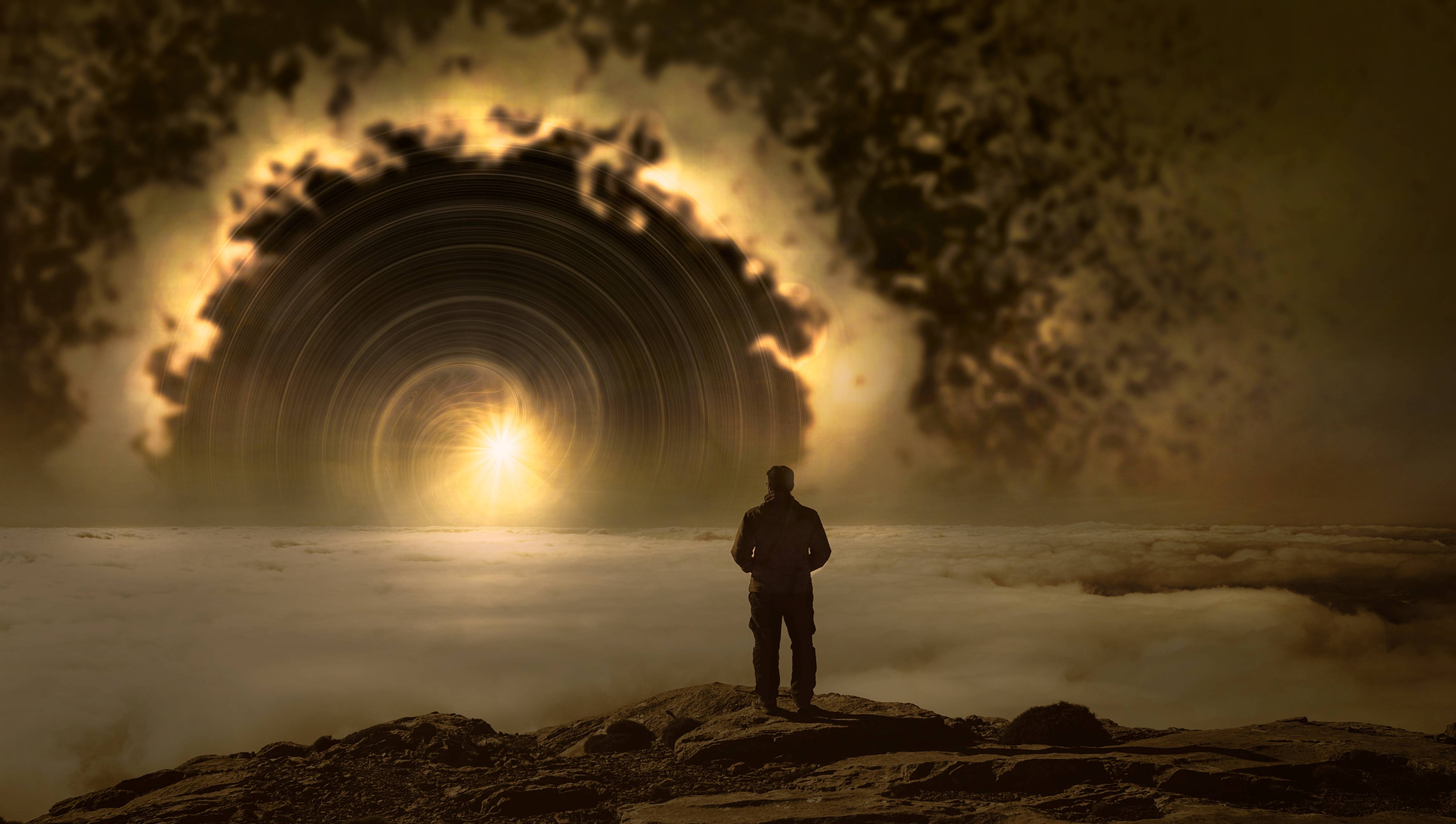 Man stands before a swirling portal in the clouds HD Wallpaper