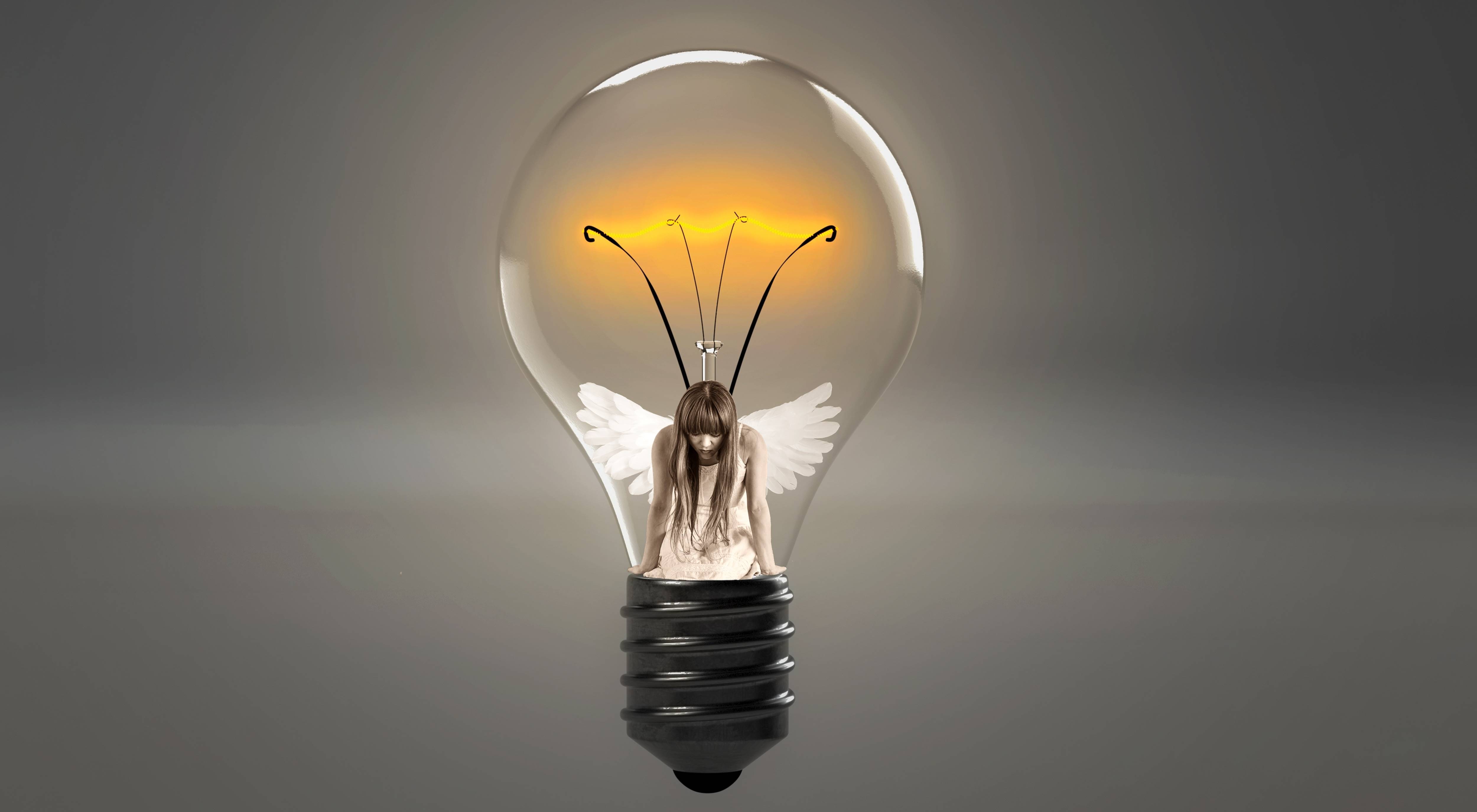 Angel inside a light bulb HD Wallpaper