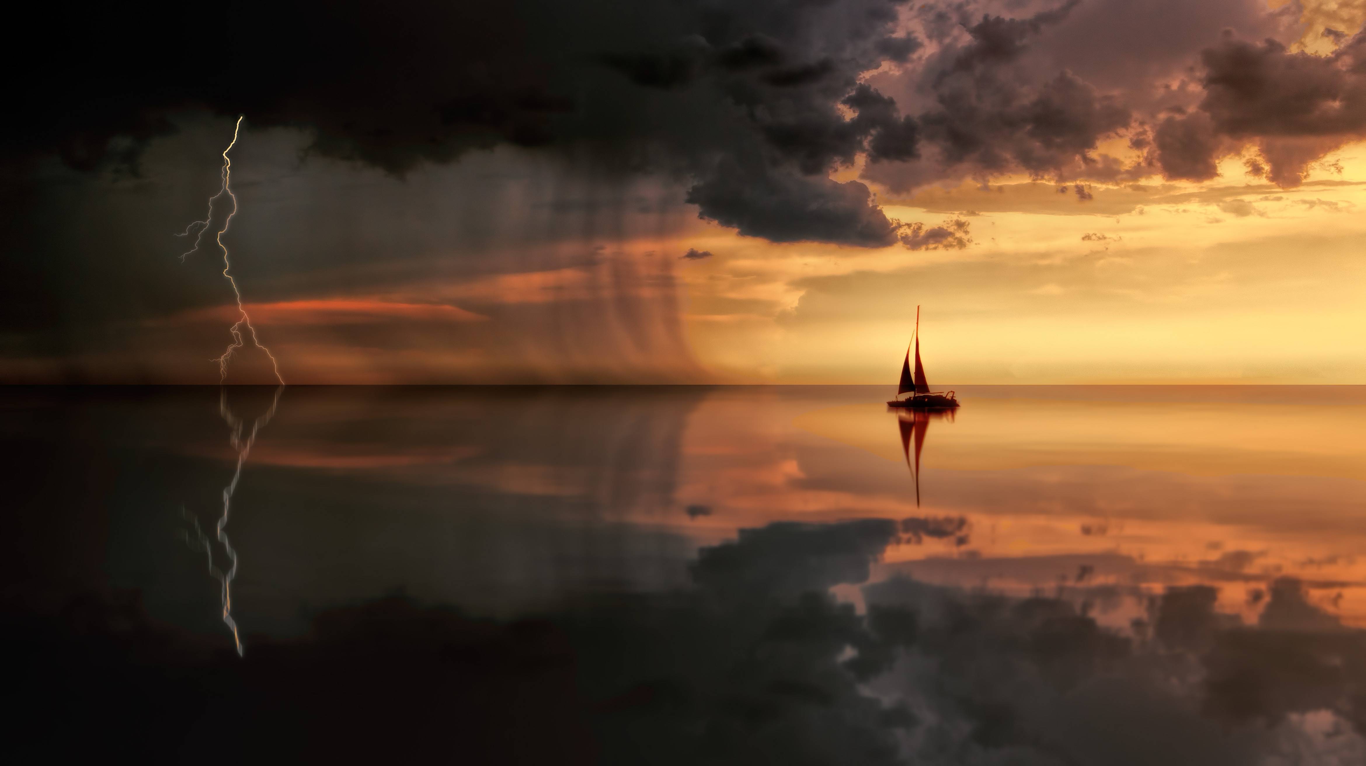 Sailboat in a thunderstorm at sunset over the ocean HD Wallpaper