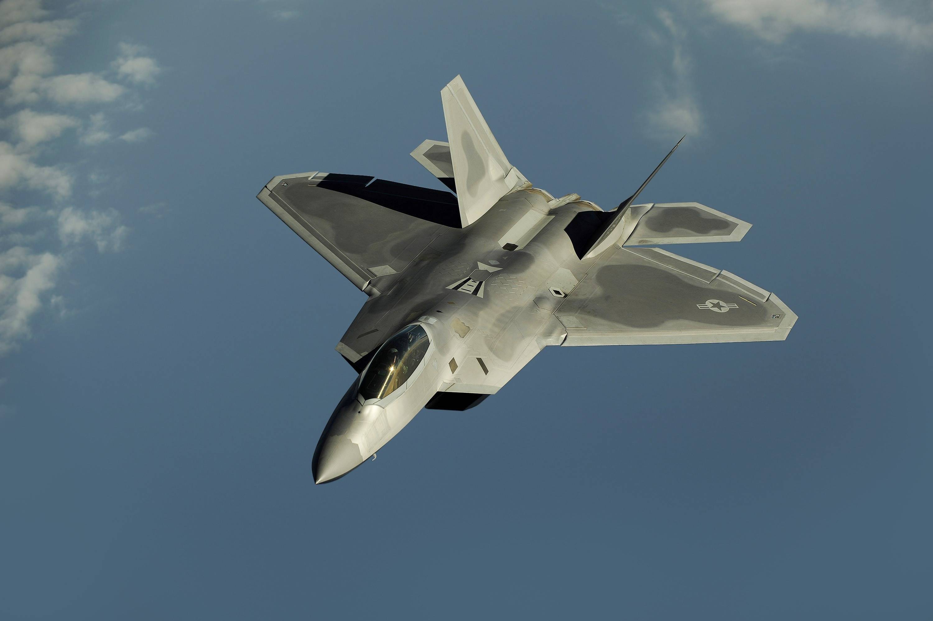 F-22 Raptor fighter jet in flight HD Wallpaper