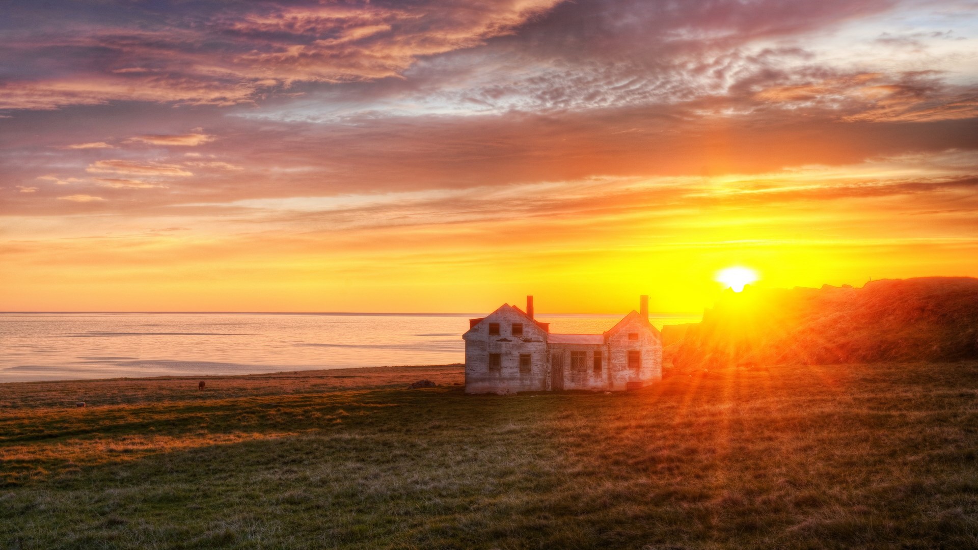 Abandoned house by the sea at sunset HD Wallpaper