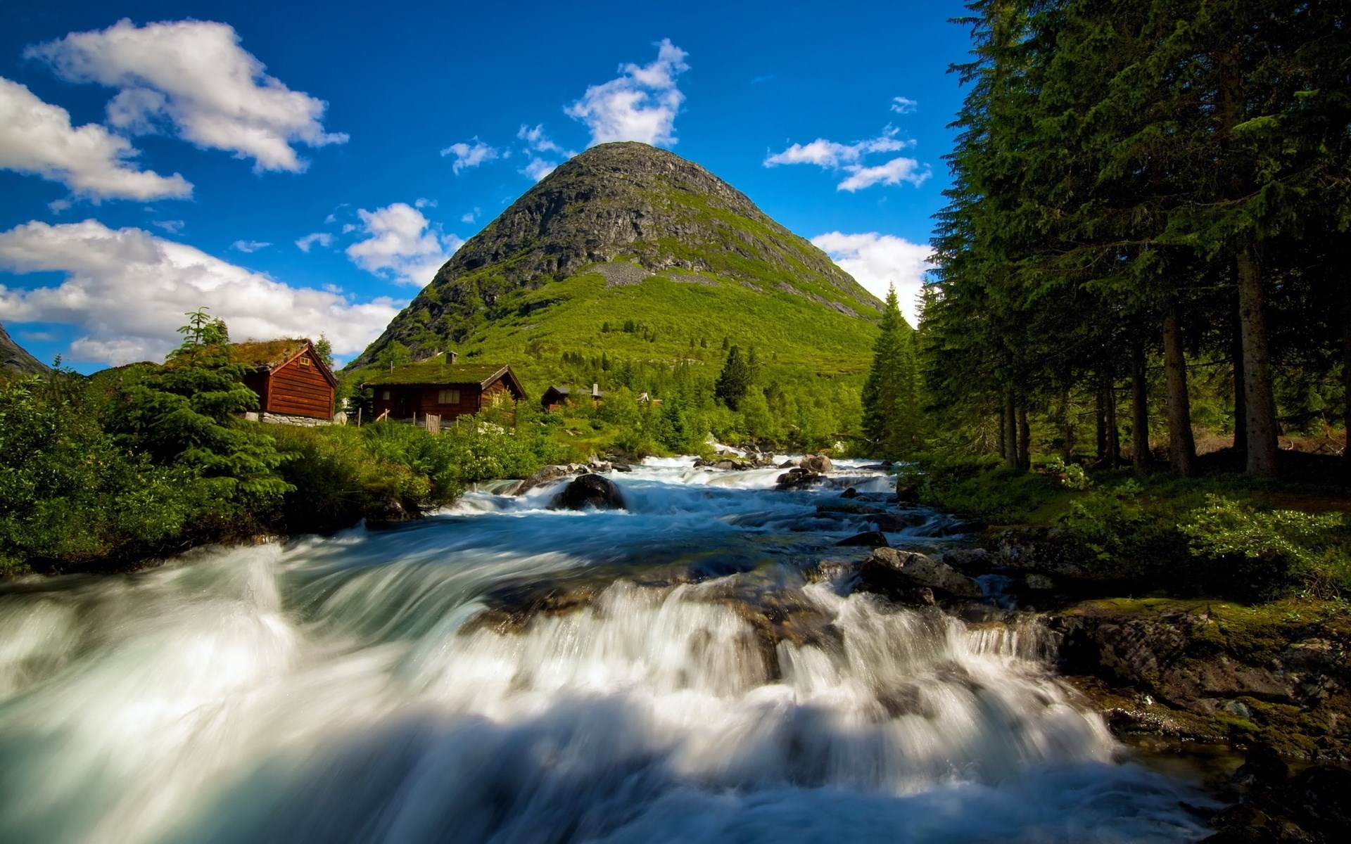 Mountain landscape with river and cabins HD Wallpaper