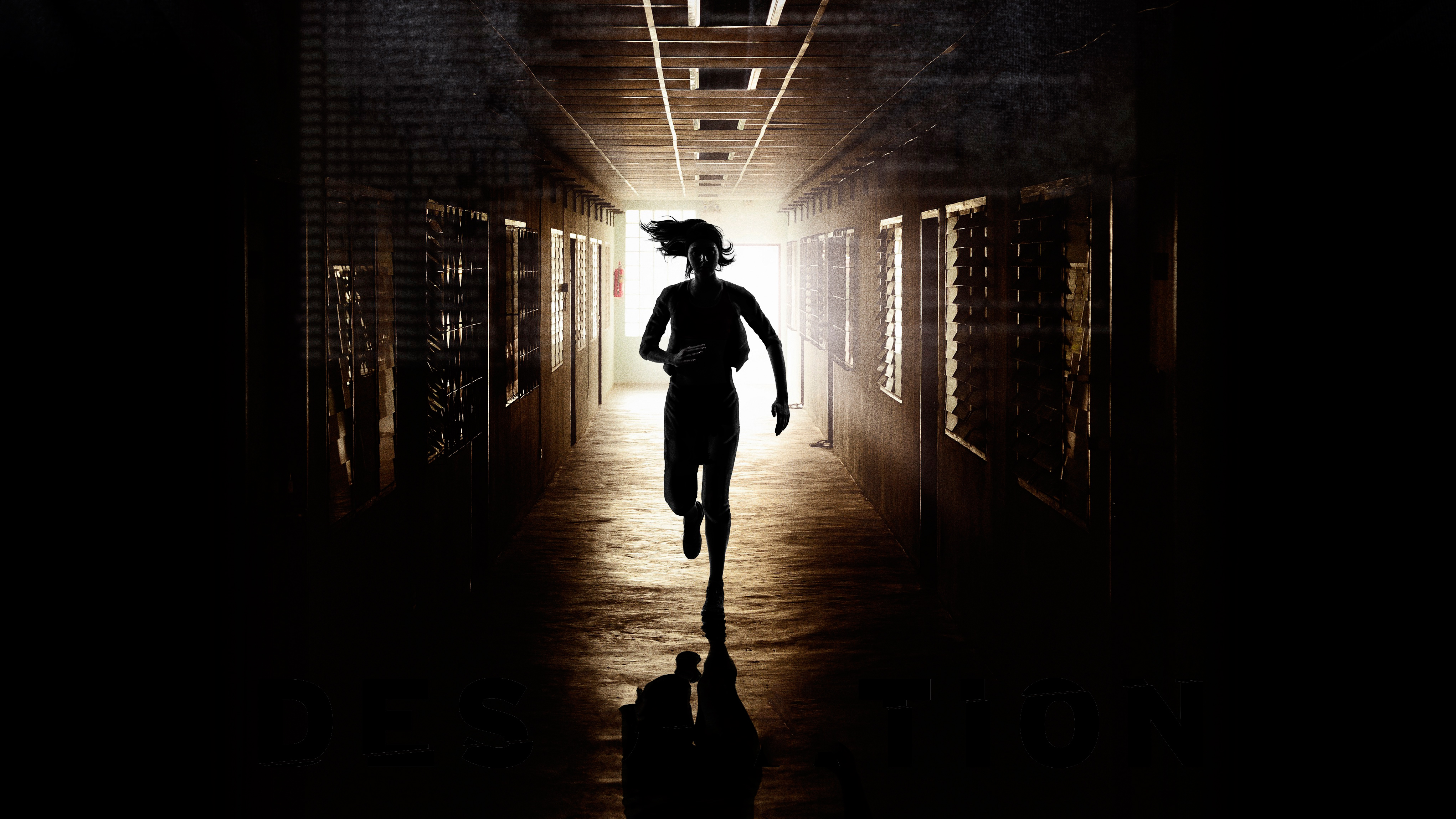 Silhouette of a person running down a dark hallway HD Wallpaper
