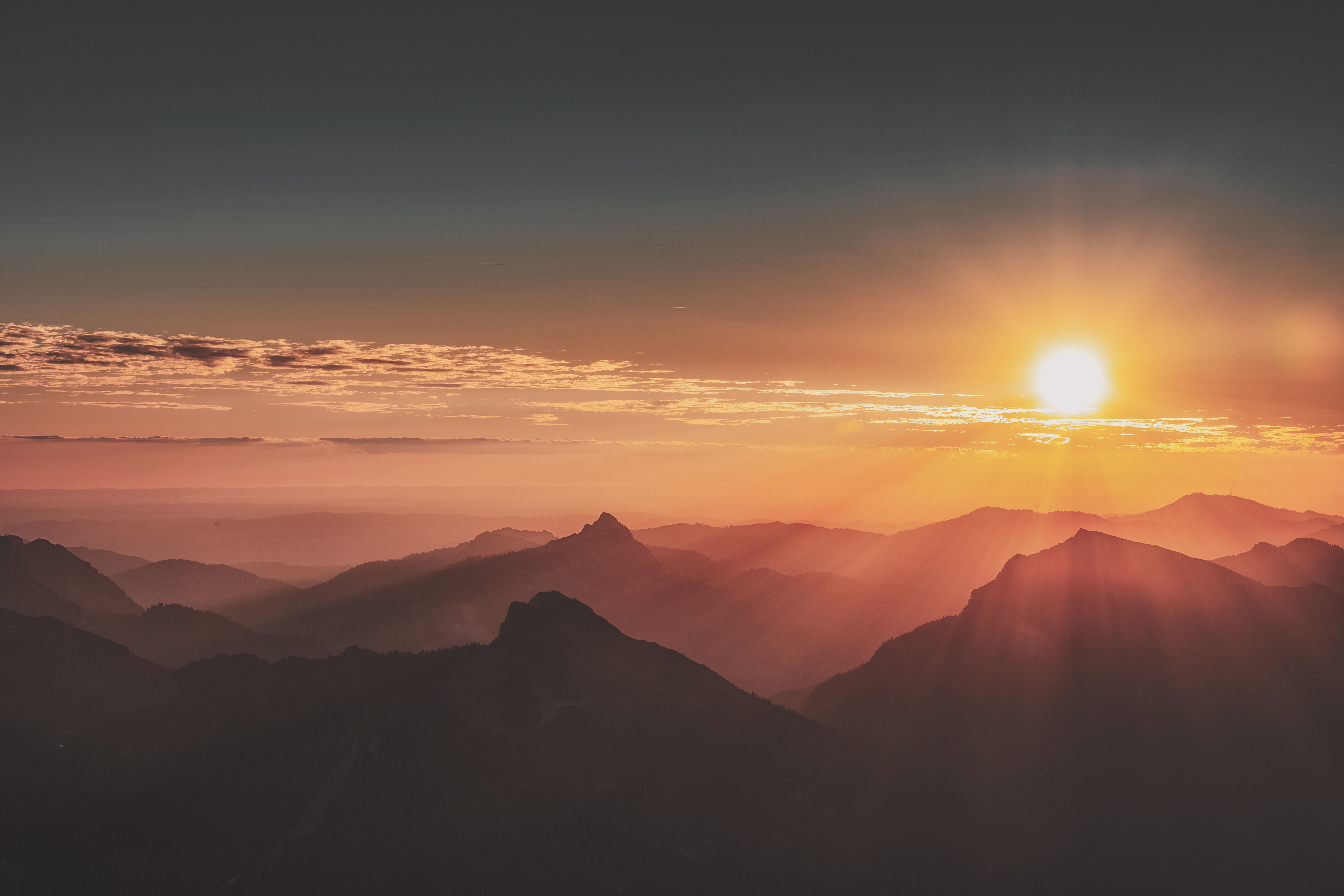 Sunrise over misty mountains in 4K HD Wallpaper
