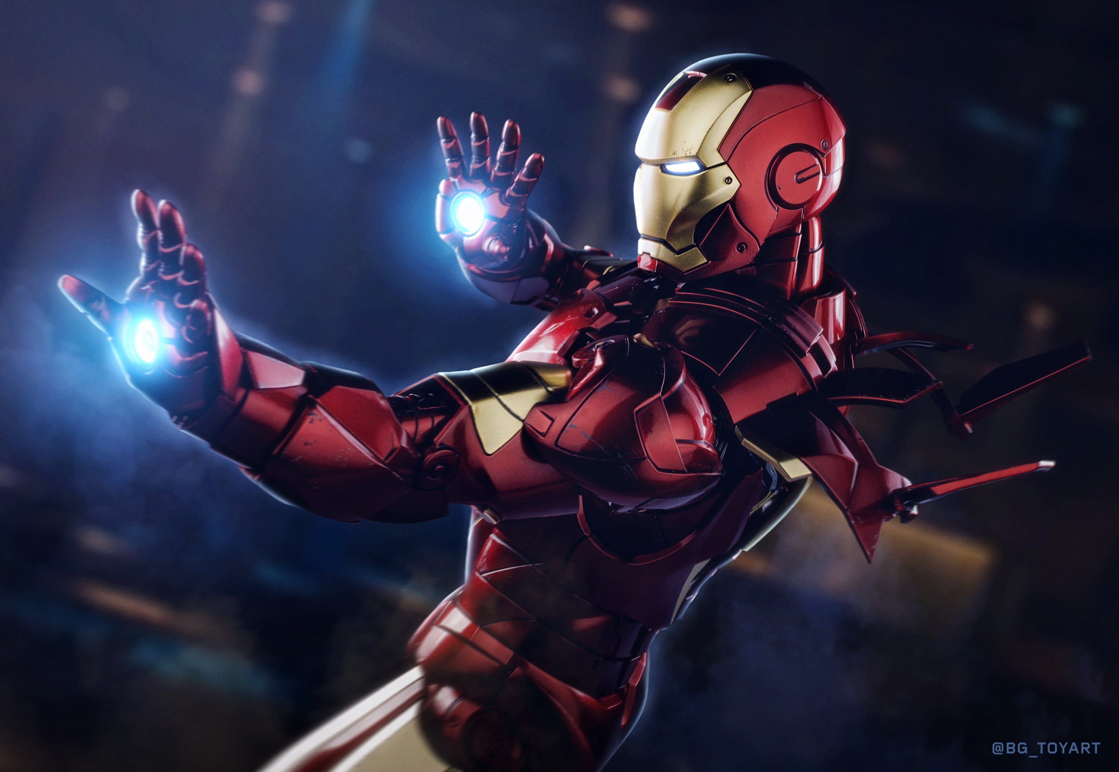 Iron Man in red and gold suit with repulsor blasts HD Wallpaper