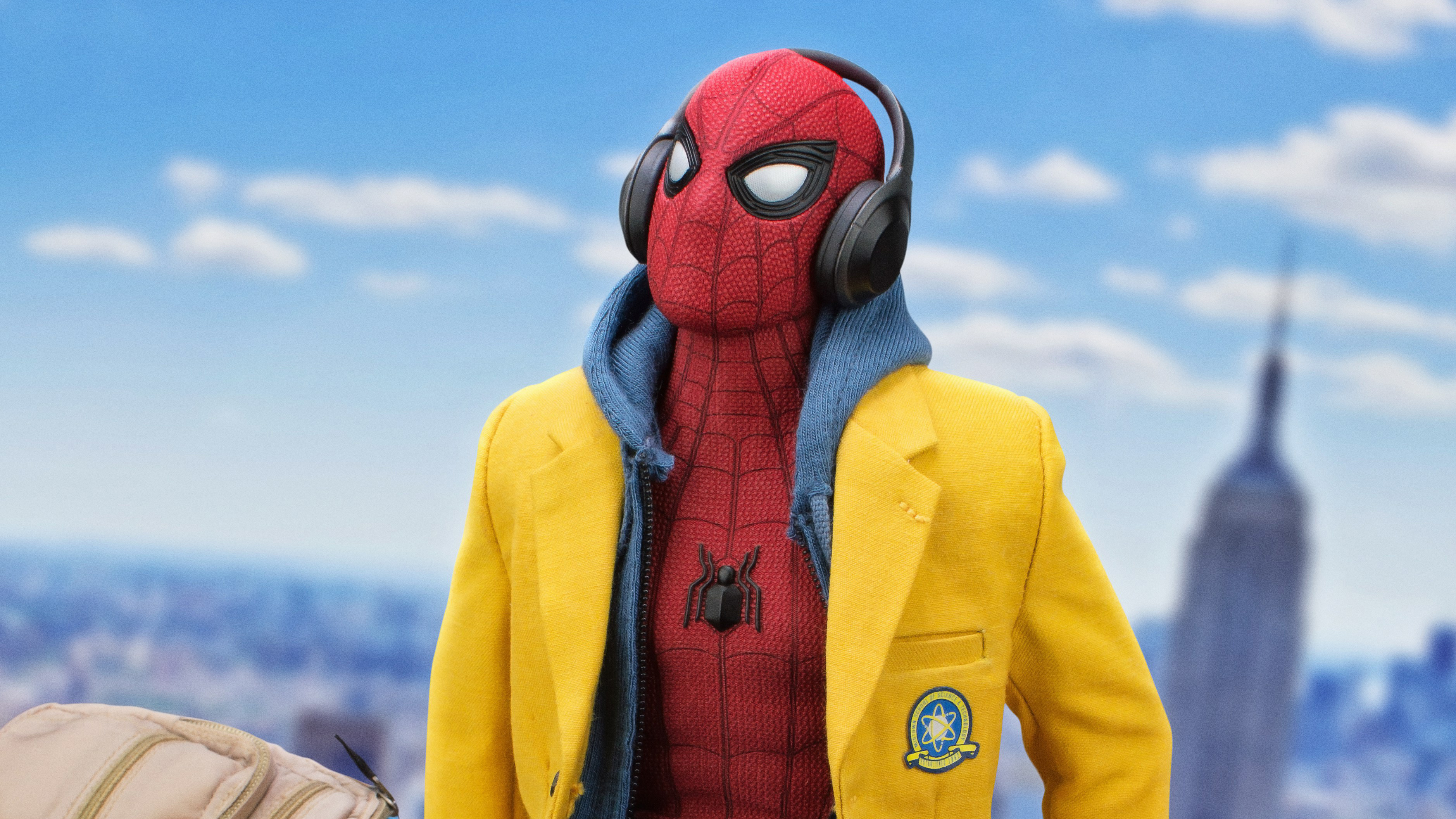 Spider-Man wearing headphones and a yellow jacket HD Wallpaper