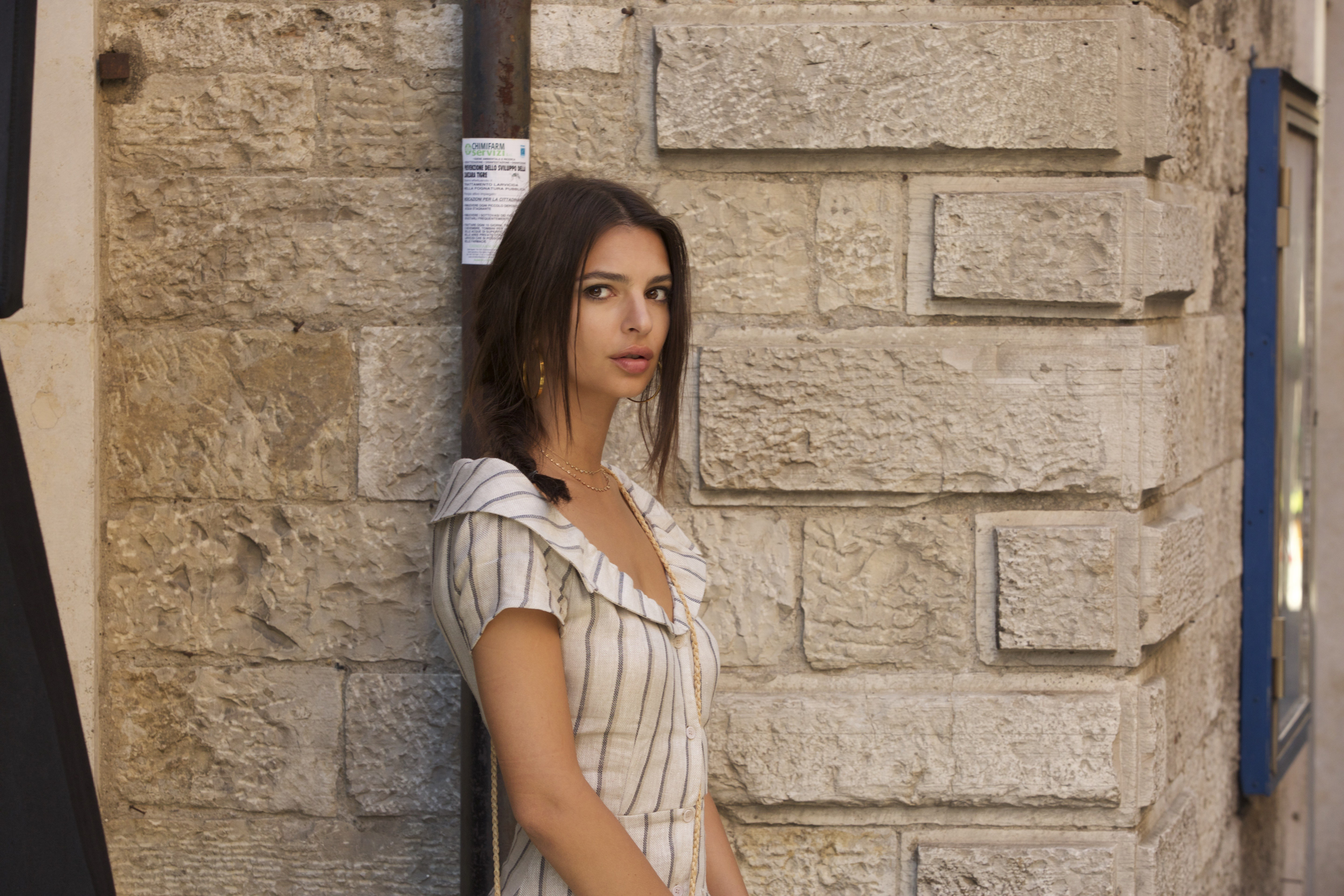 Emily Ratajkowski Poses Against a Stone Wall HD Wallpaper