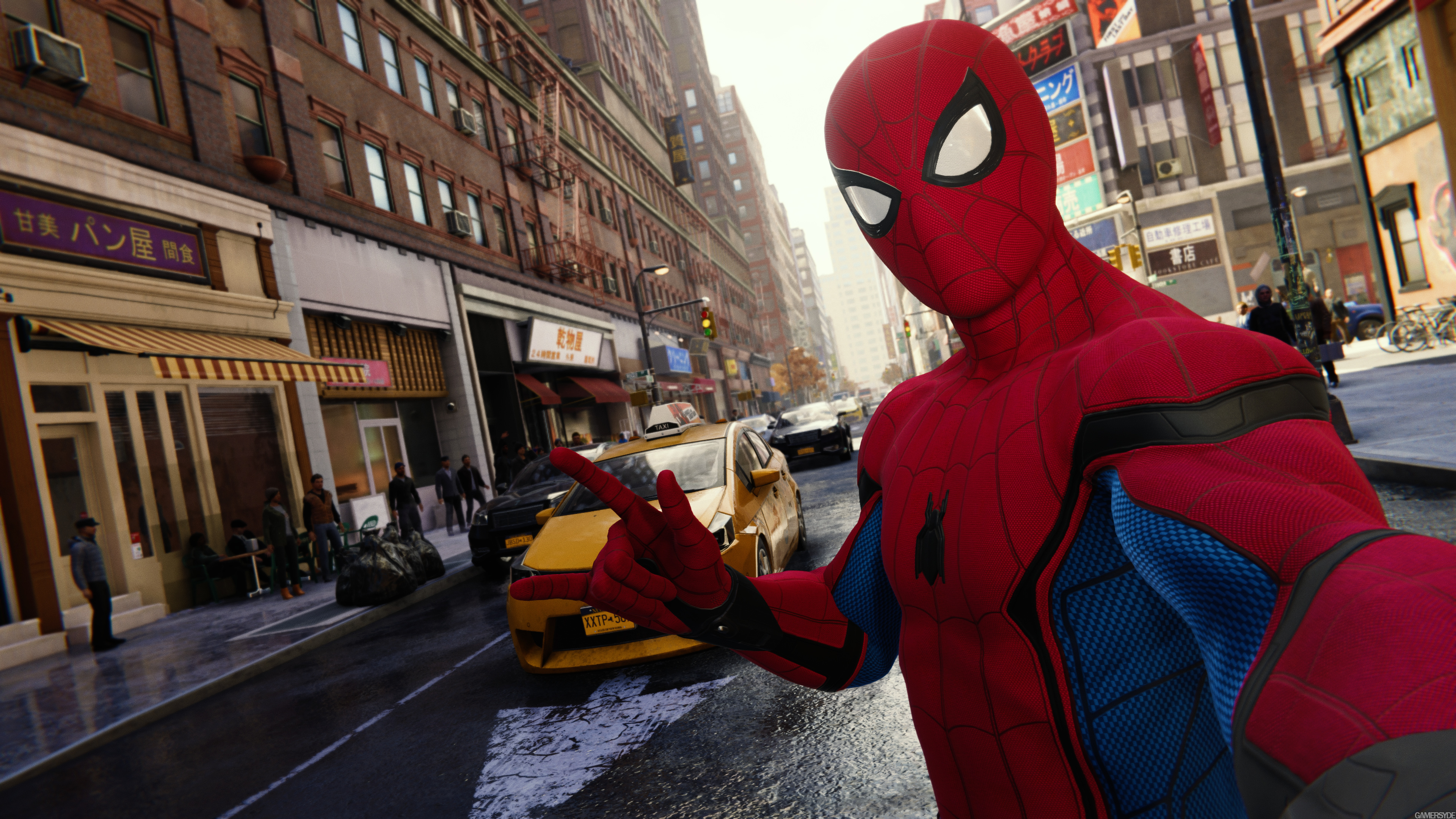 Spider-Man taking a selfie in a city street HD Wallpaper