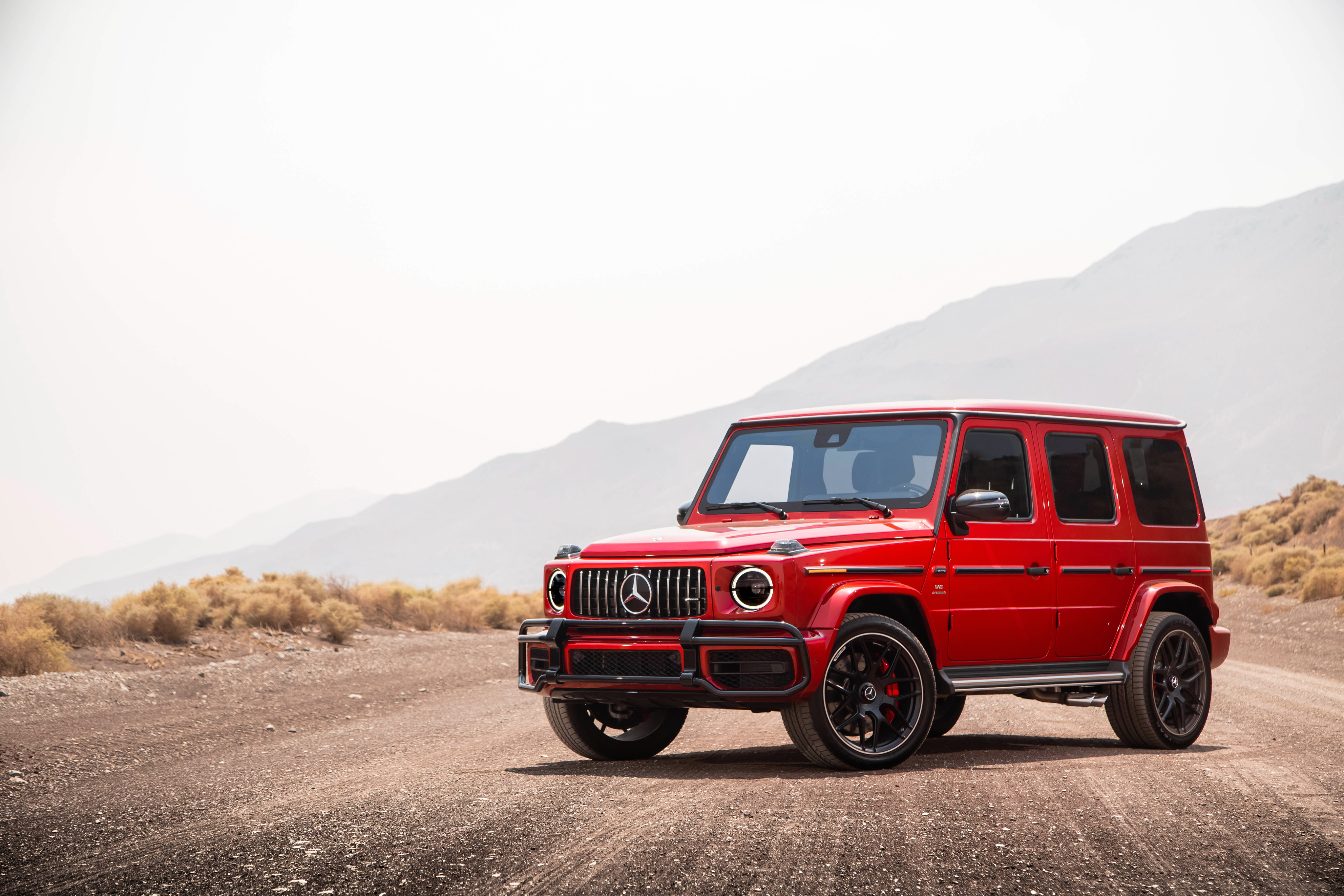 Red Mercedes-AMG G 63 in a Desert Landscape HD Wallpaper