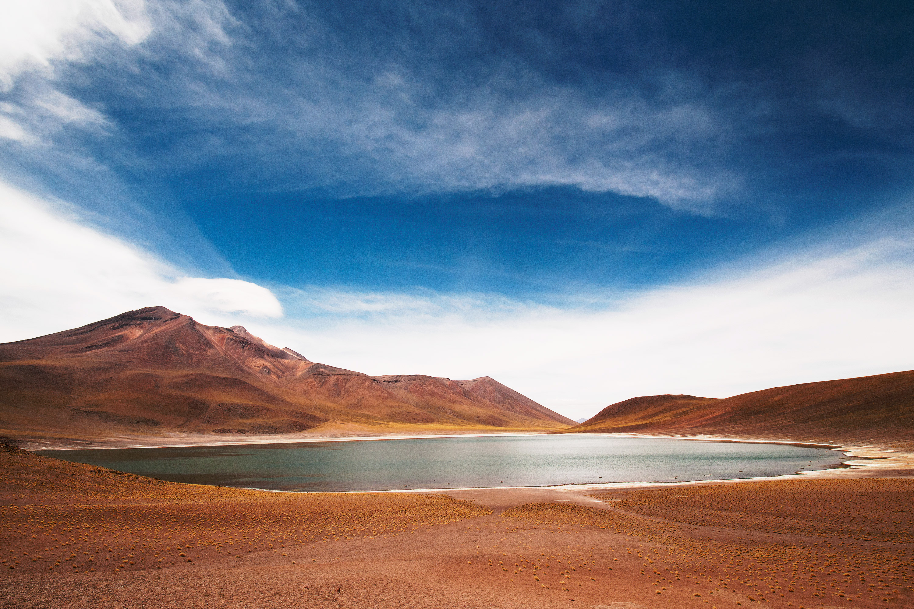 Lake and mountains under a blue sky HD Wallpaper