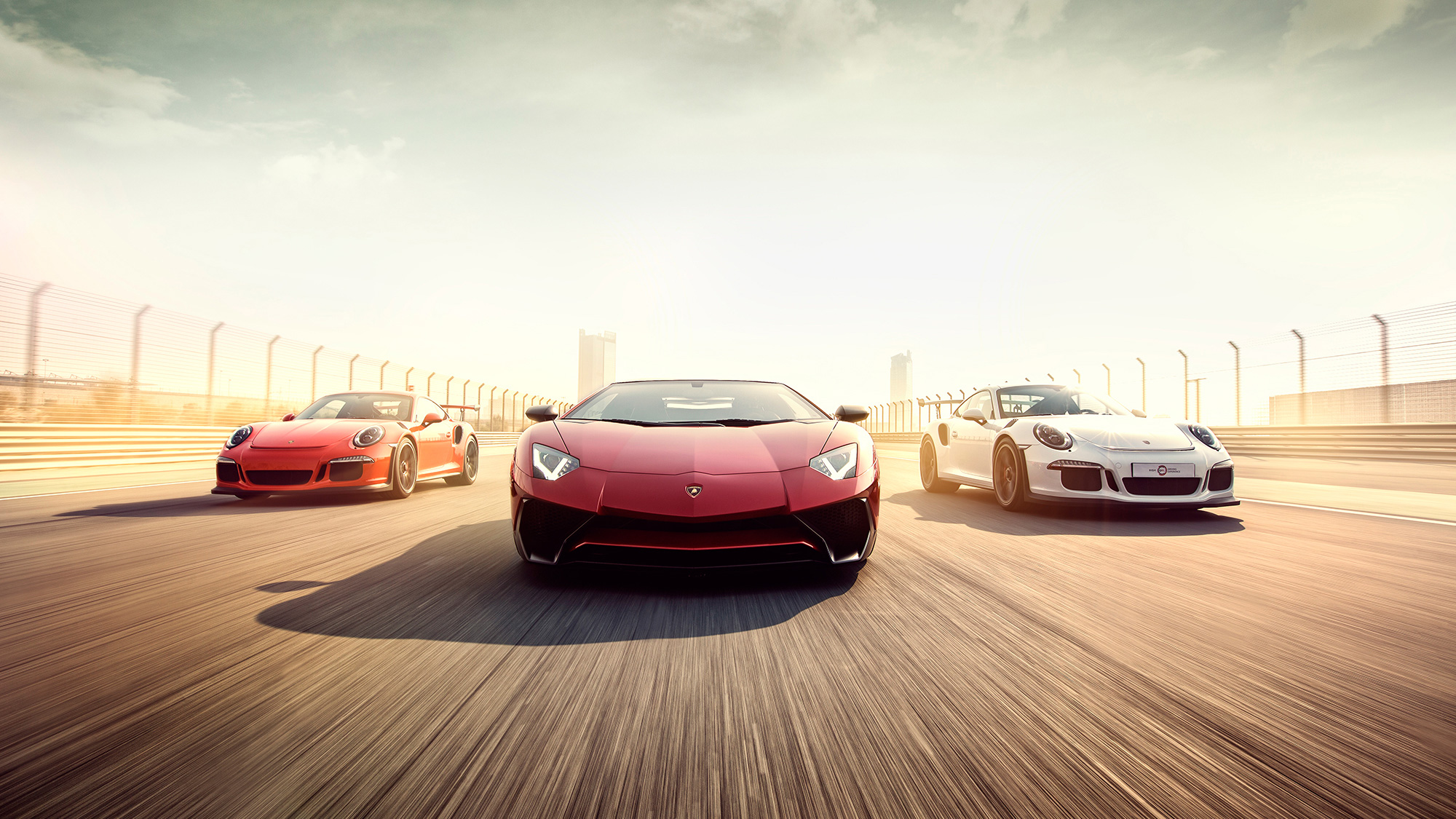 Lamborghini Aventador and Porsche 918 on a Racetrack HD Wallpaper