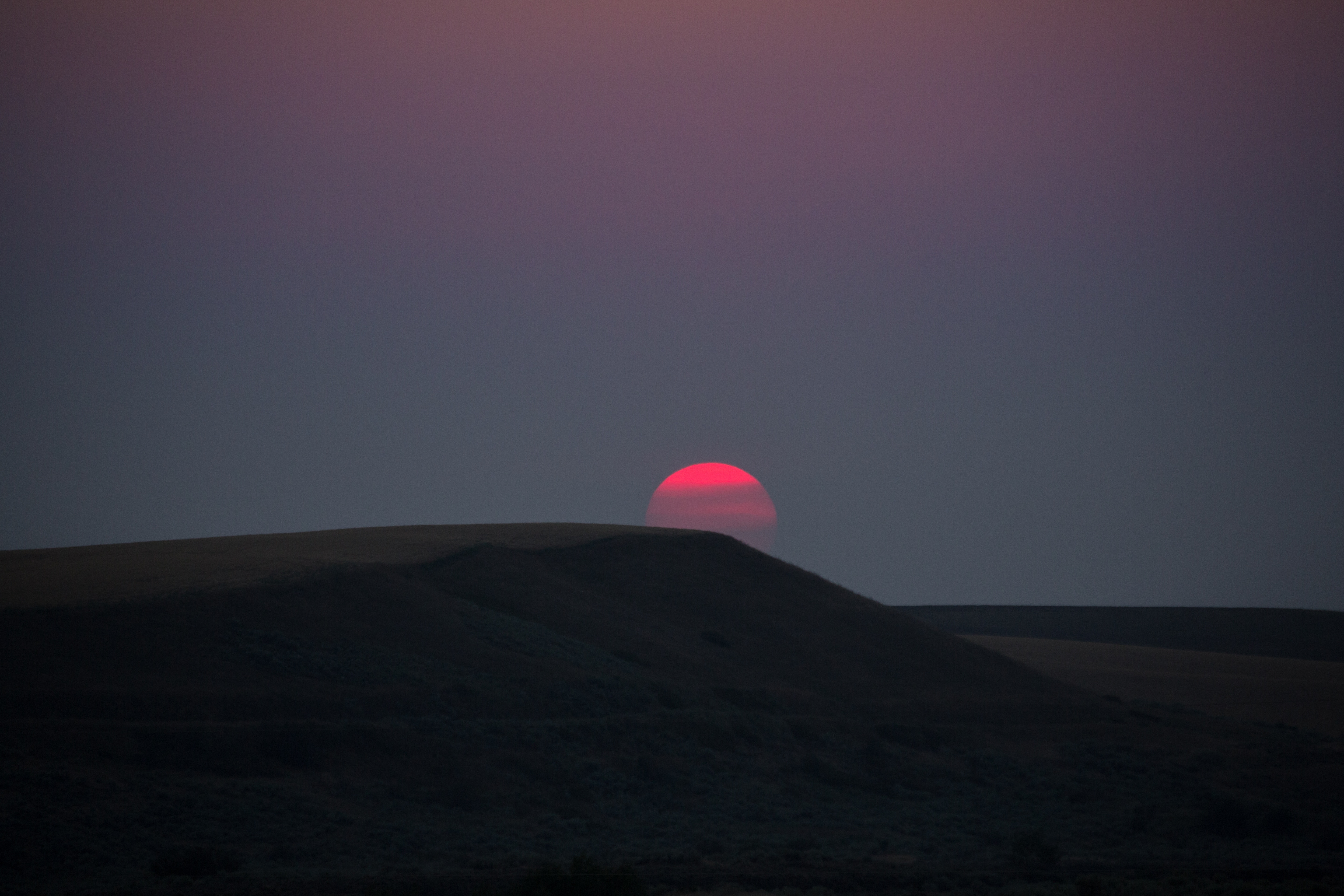 Sunset over rolling hills HD Wallpaper
