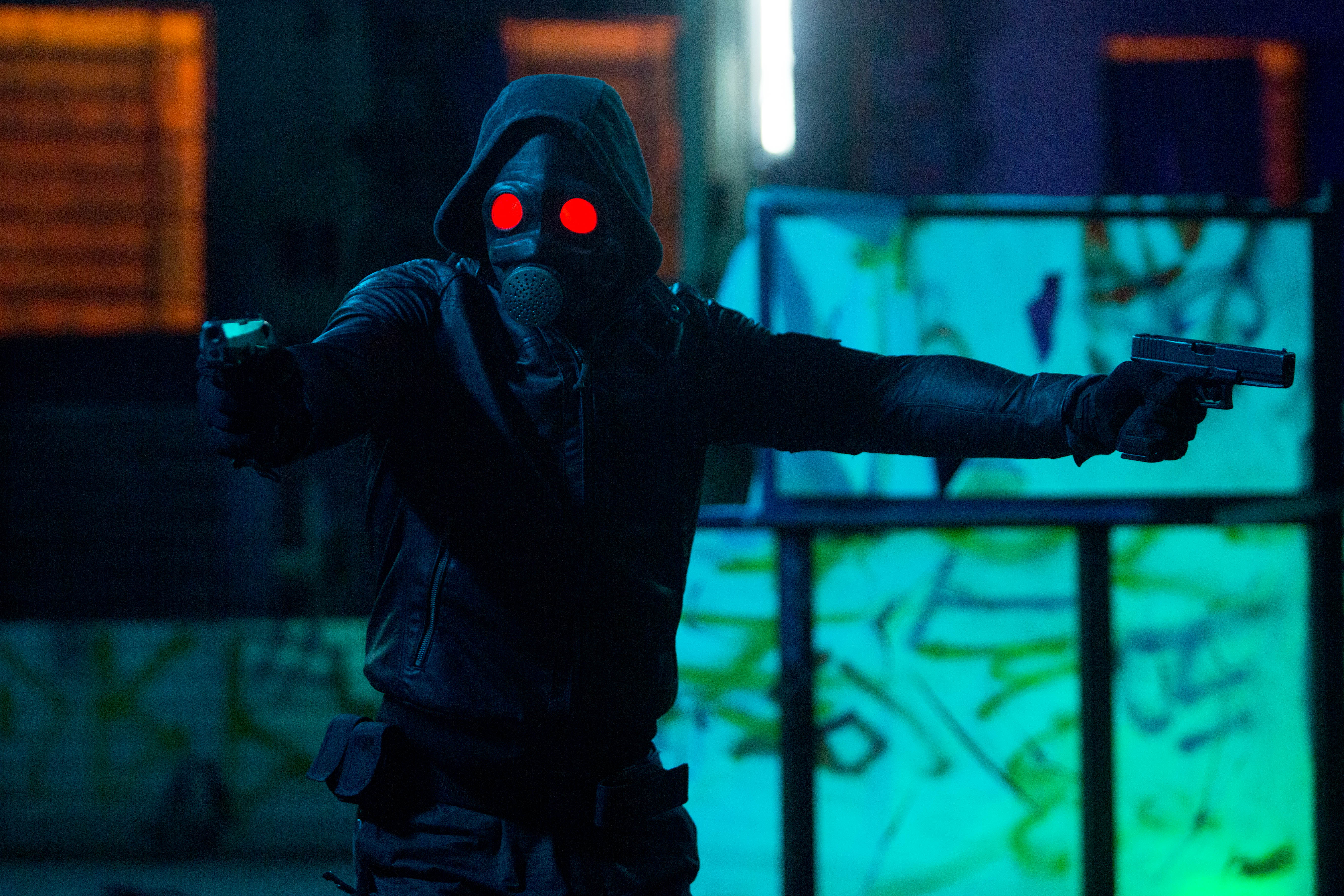 The Awakener character with red glowing eyes and guns HD Wallpaper