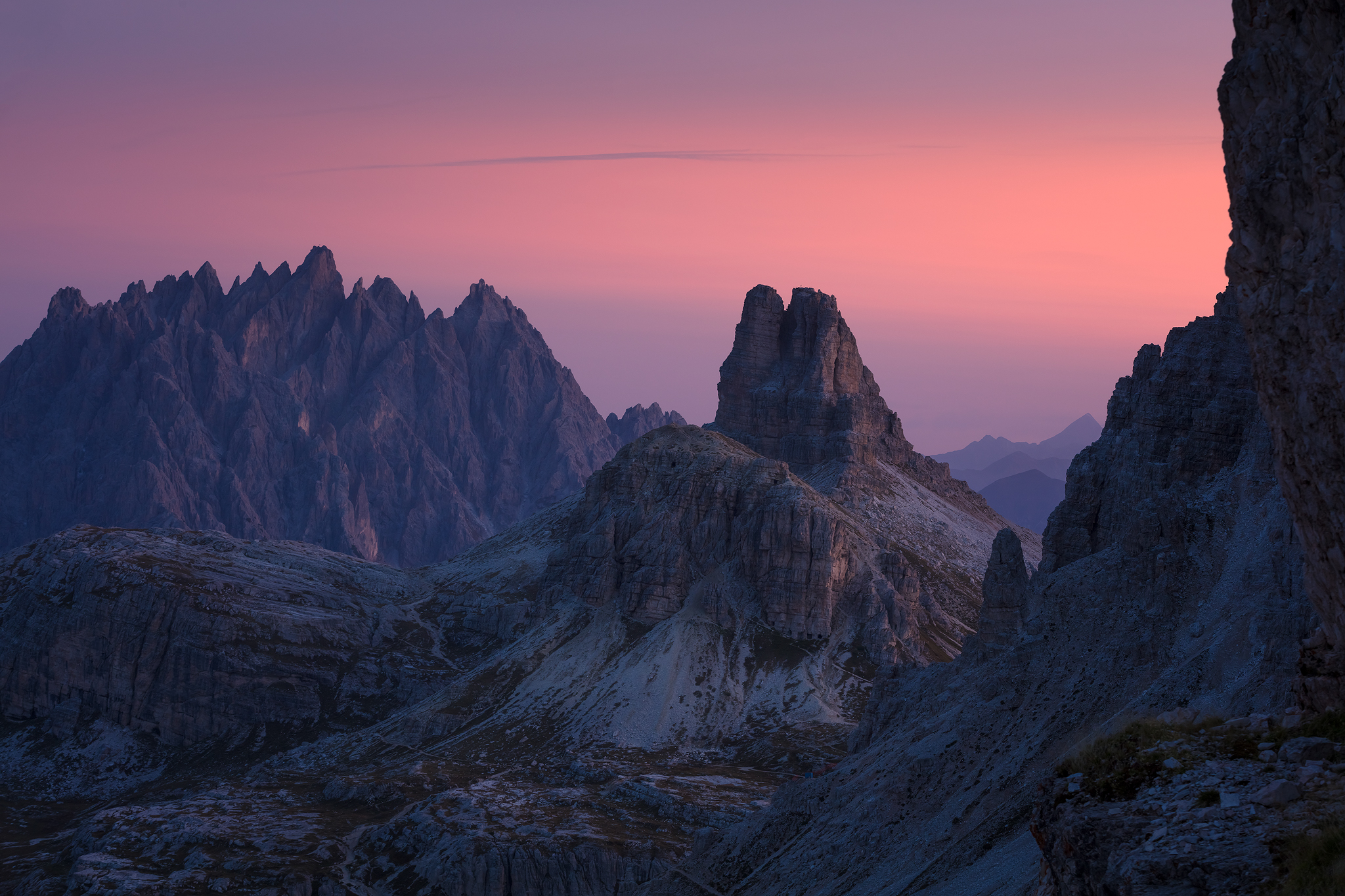 Jagged mountains at sunset with pink sky HD Wallpaper