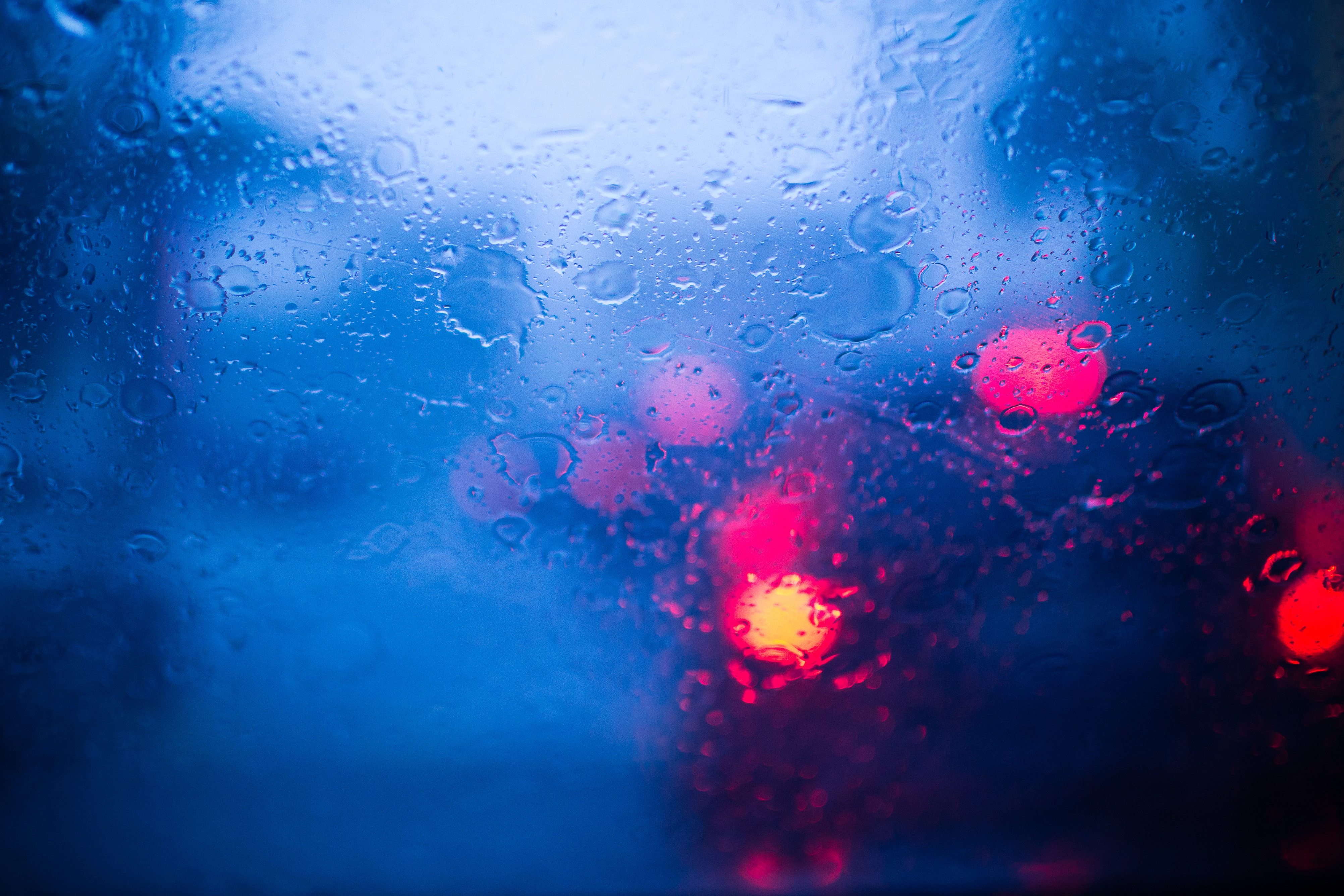 Rainy day with red bokeh lights 4K HD Wallpaper
