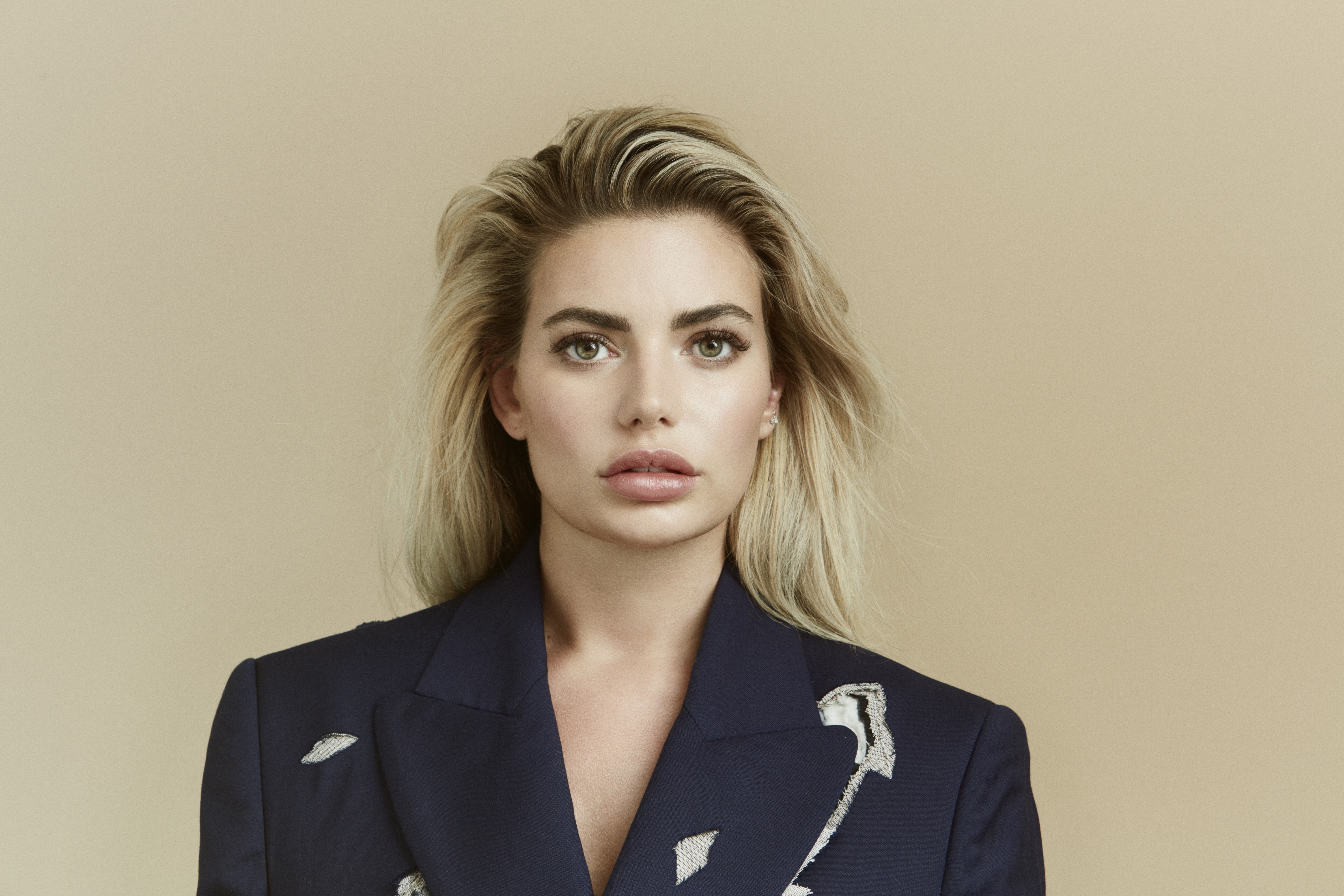 Megan Barton Hanson in a navy blazer HD Wallpaper