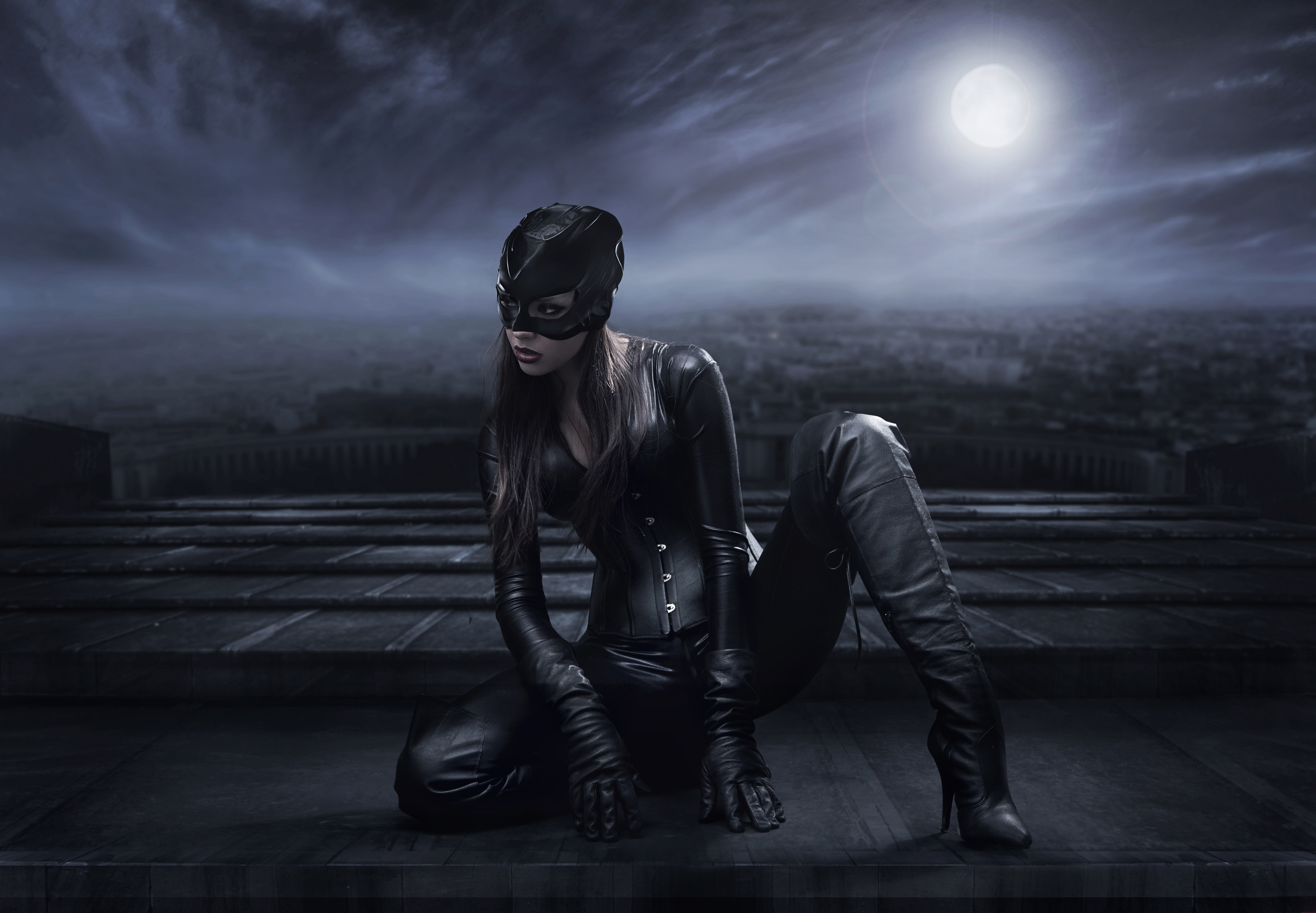 Catwoman on a rooftop under the moon HD Wallpaper