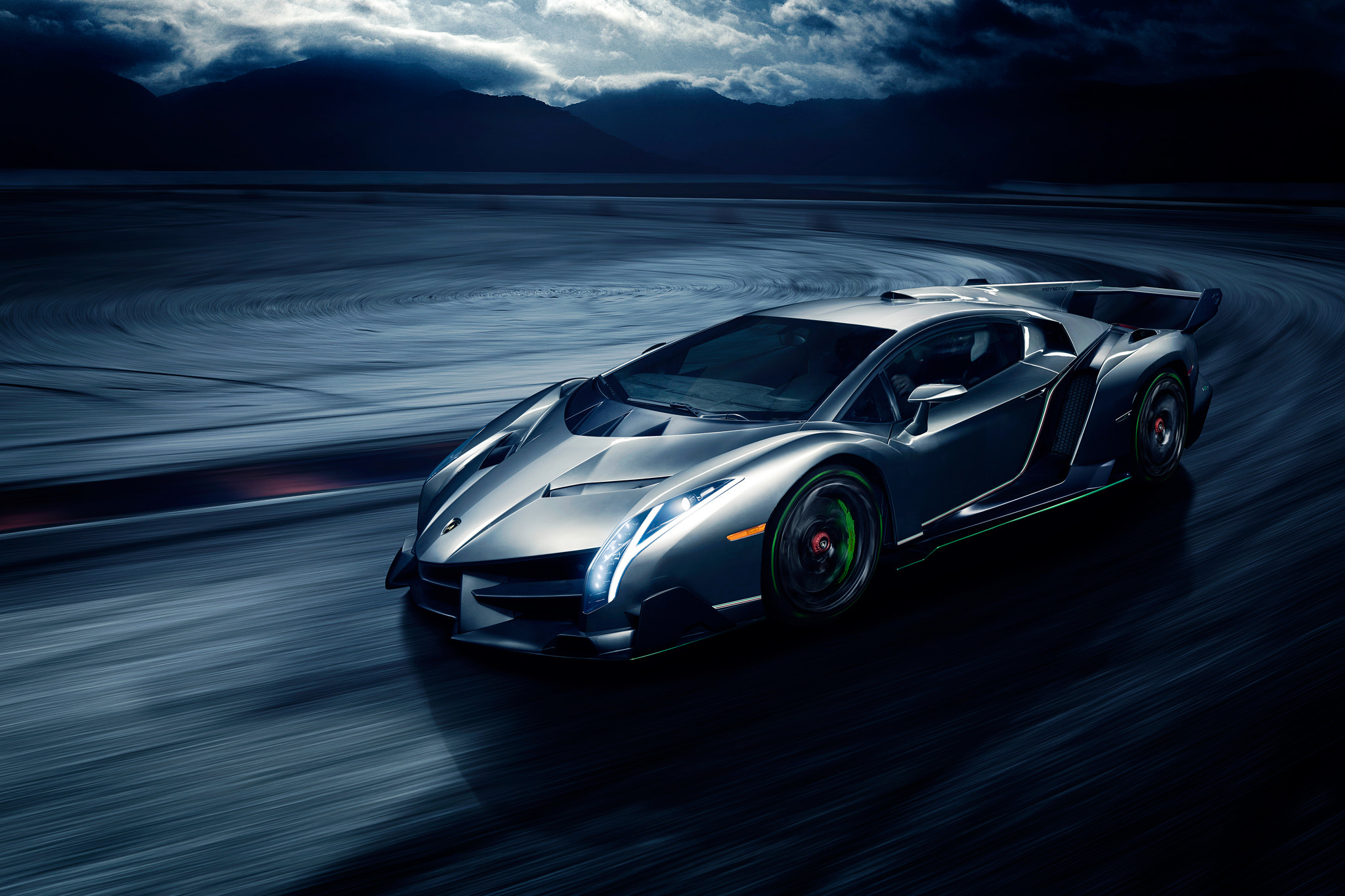 Lamborghini Veneno driving on a dark road HD Wallpaper
