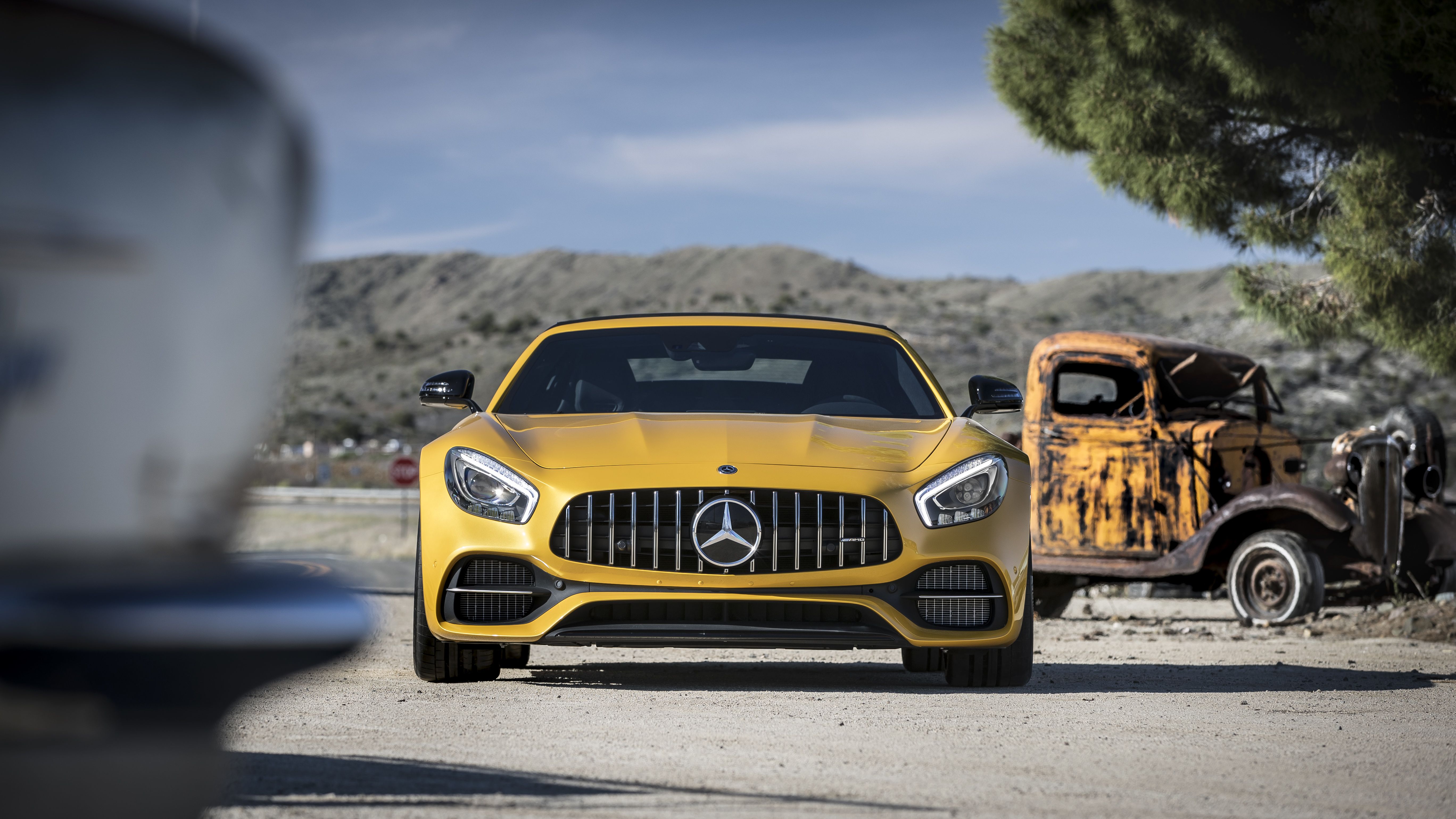 Yellow Mercedes-AMG GT R in a desert landscape HD Wallpaper