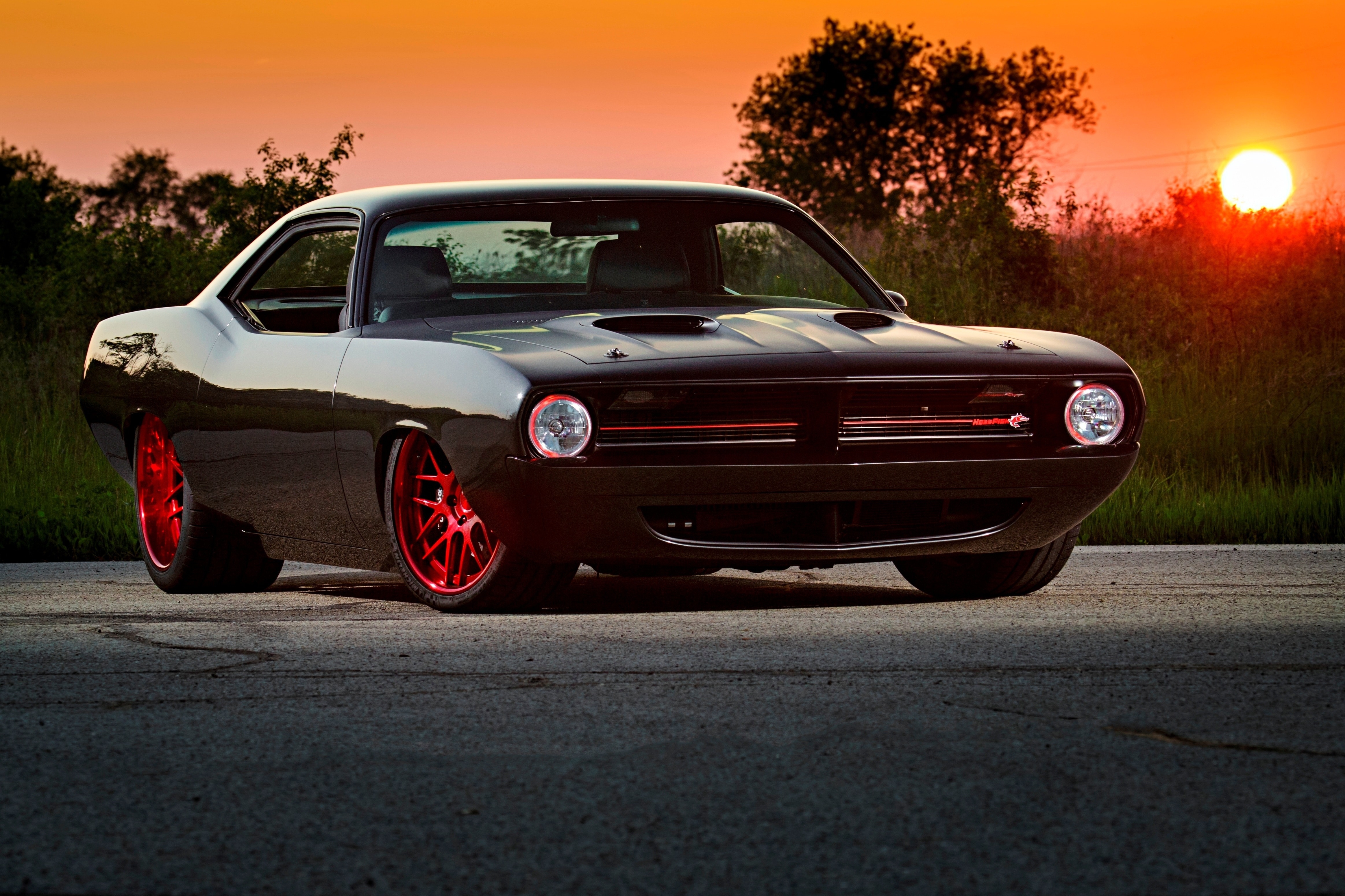 Black 1970 Plymouth Barracuda with red rims HD Wallpaper