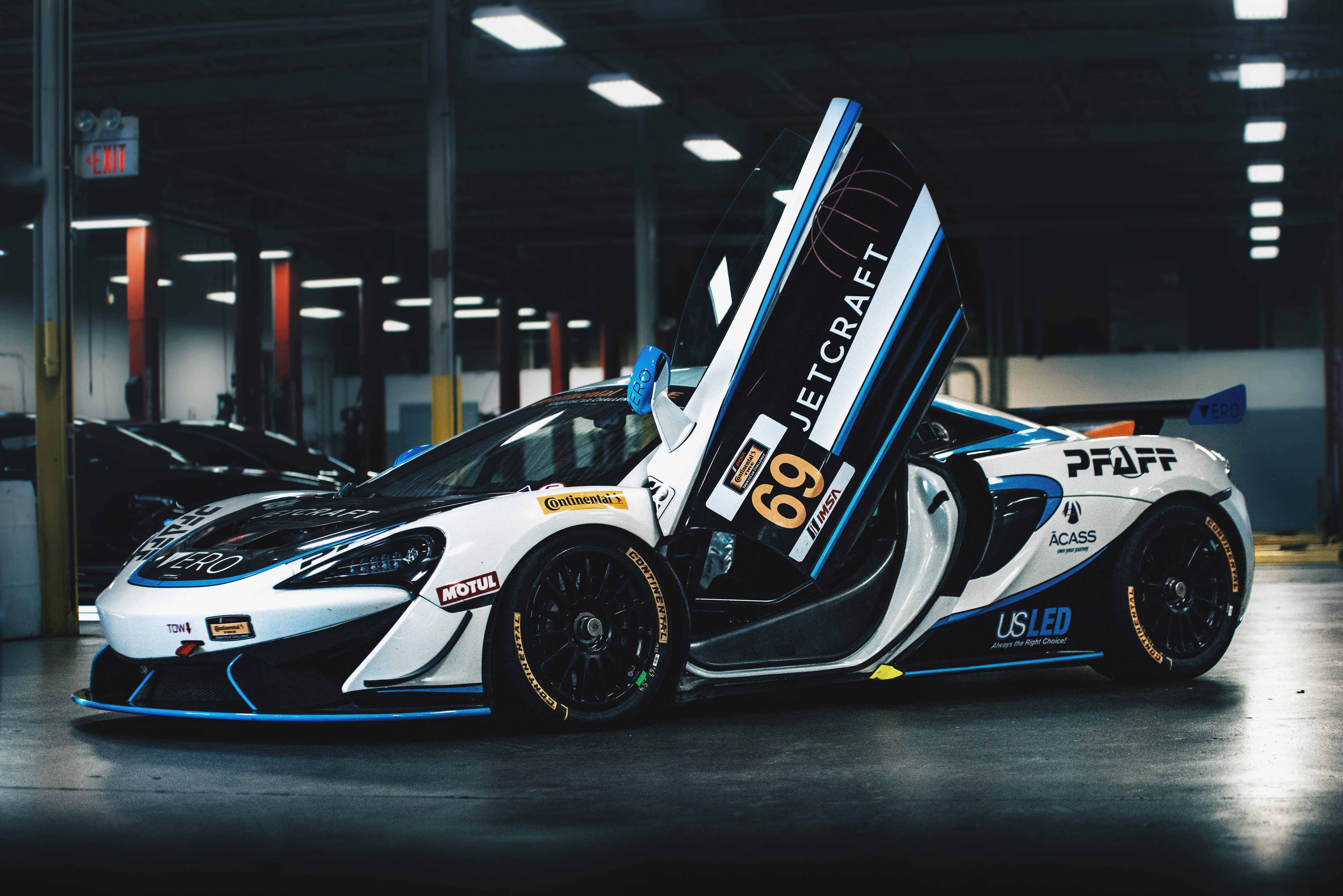 McLaren 570S Spider with butterfly doors open HD Wallpaper