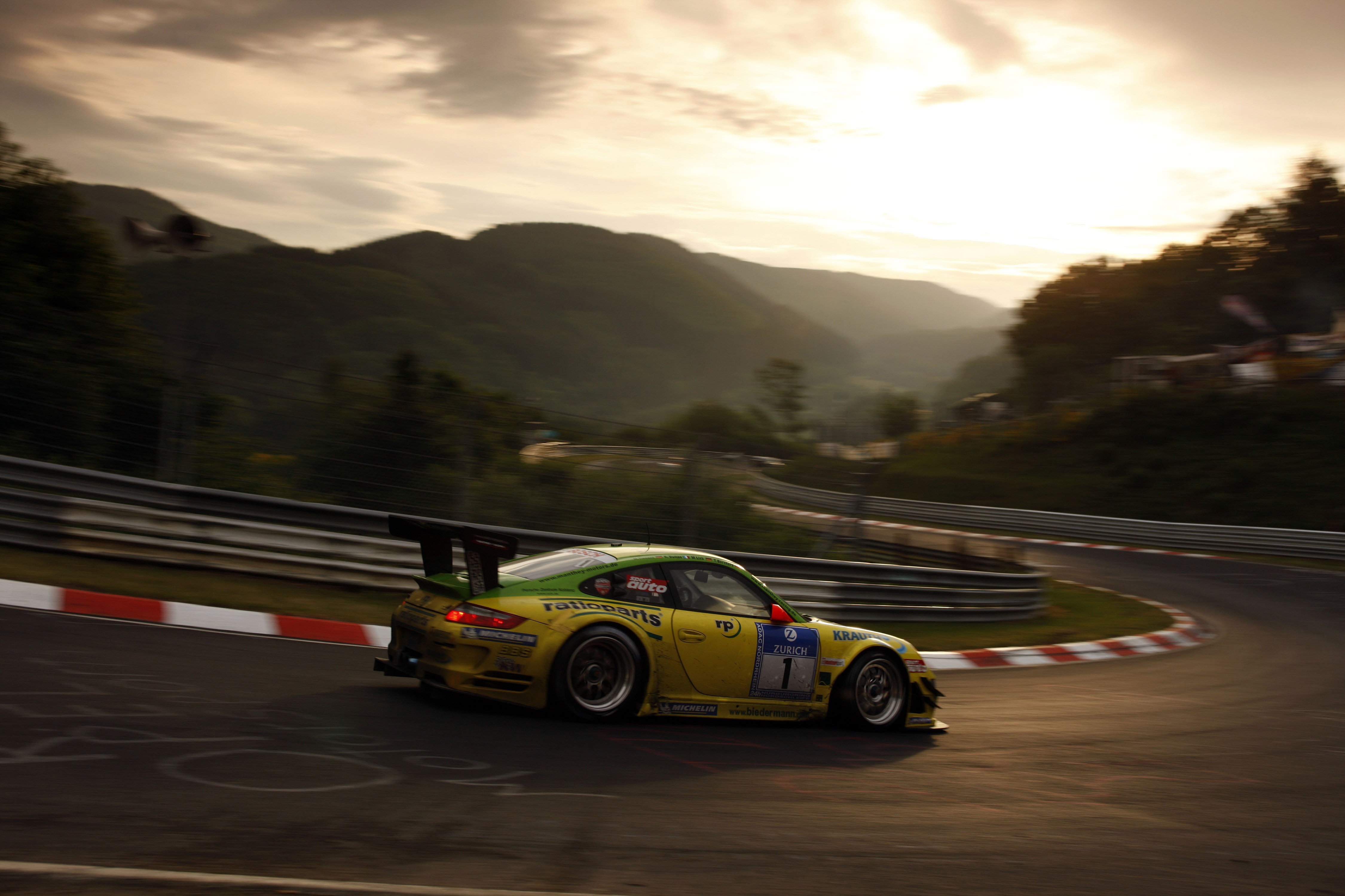 Porsche race car on a mountain track HD Wallpaper