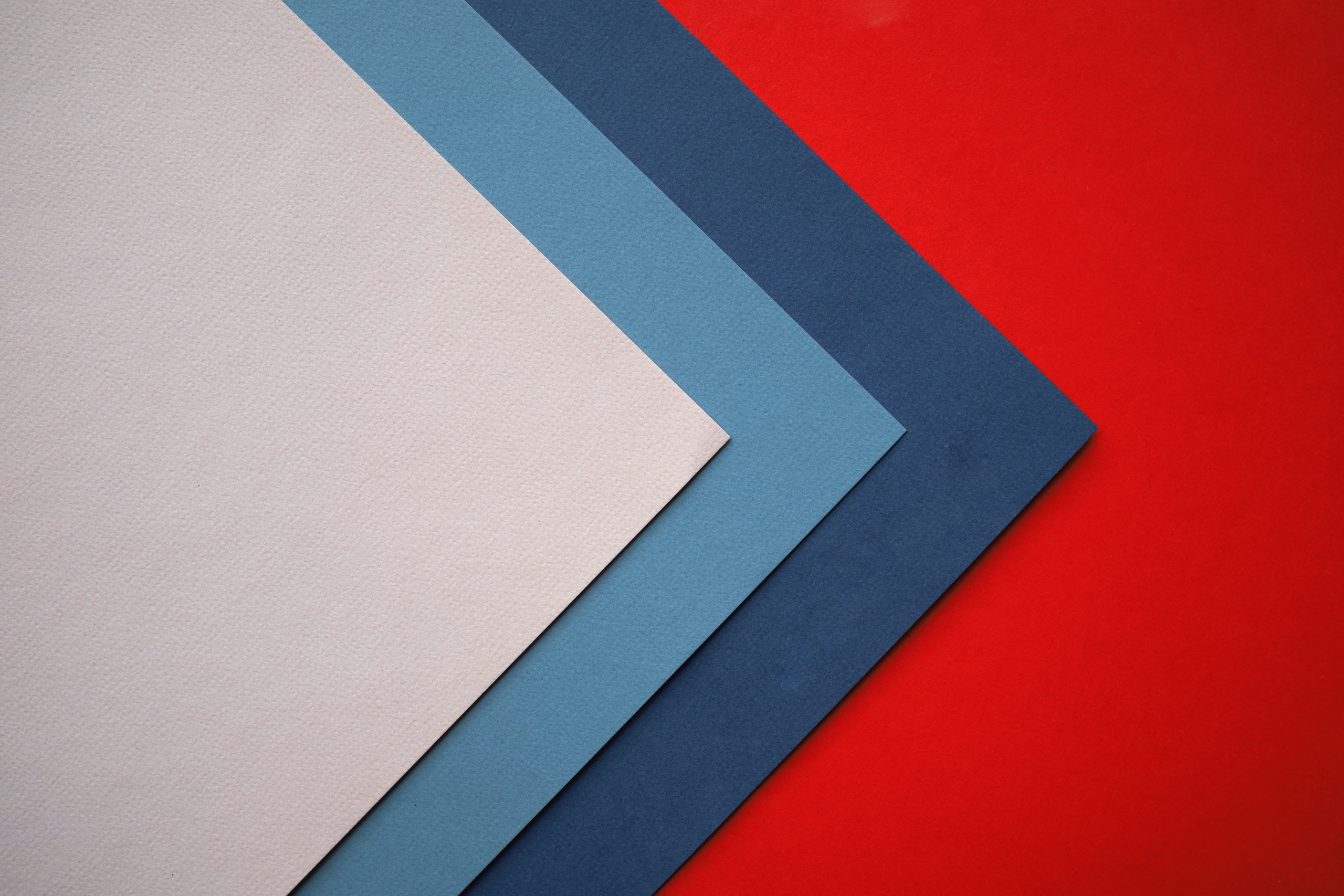 Abstract arrangement of colored paper sheets HD Wallpaper