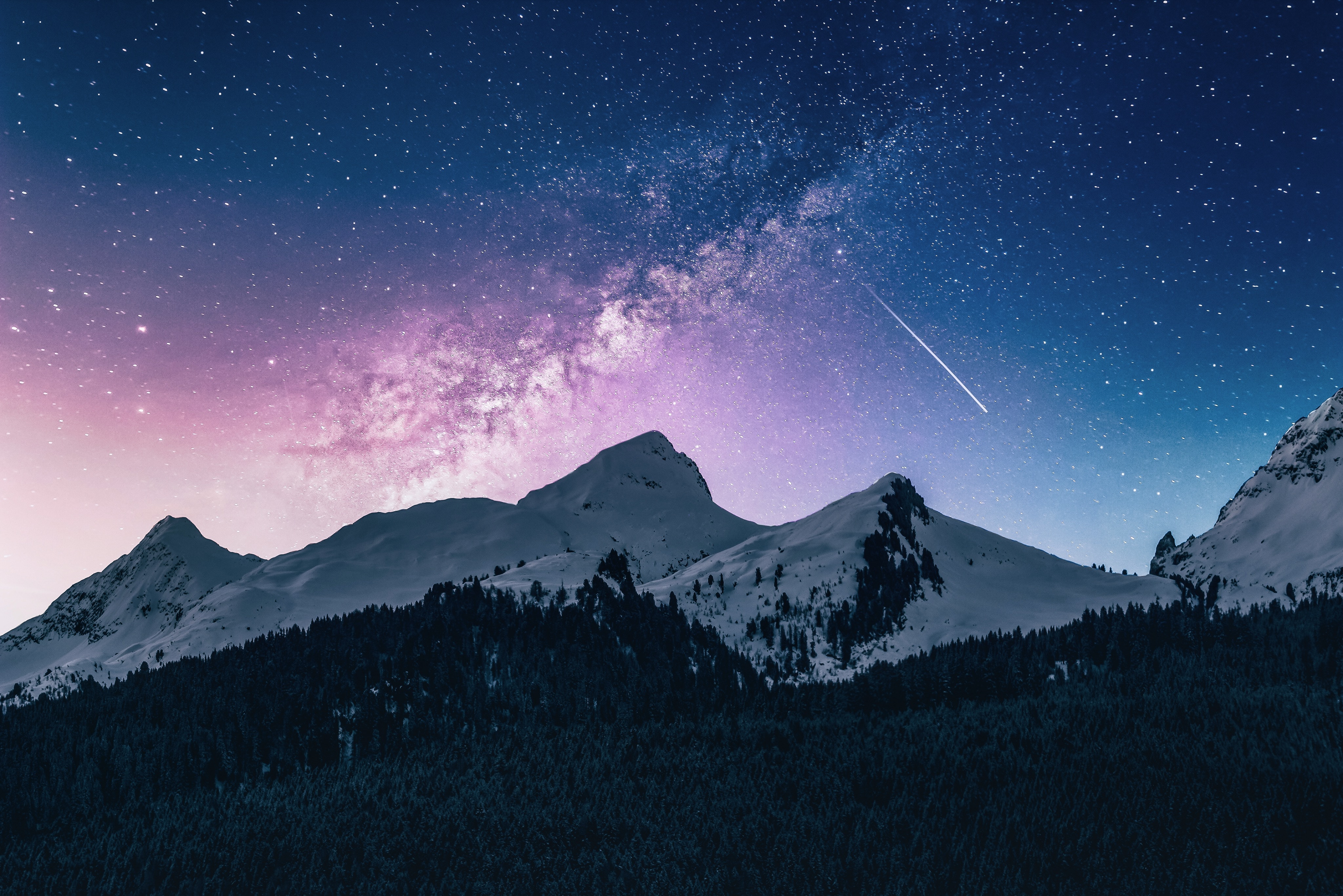 Milky Way over snow-capped mountains and forest HD Wallpaper