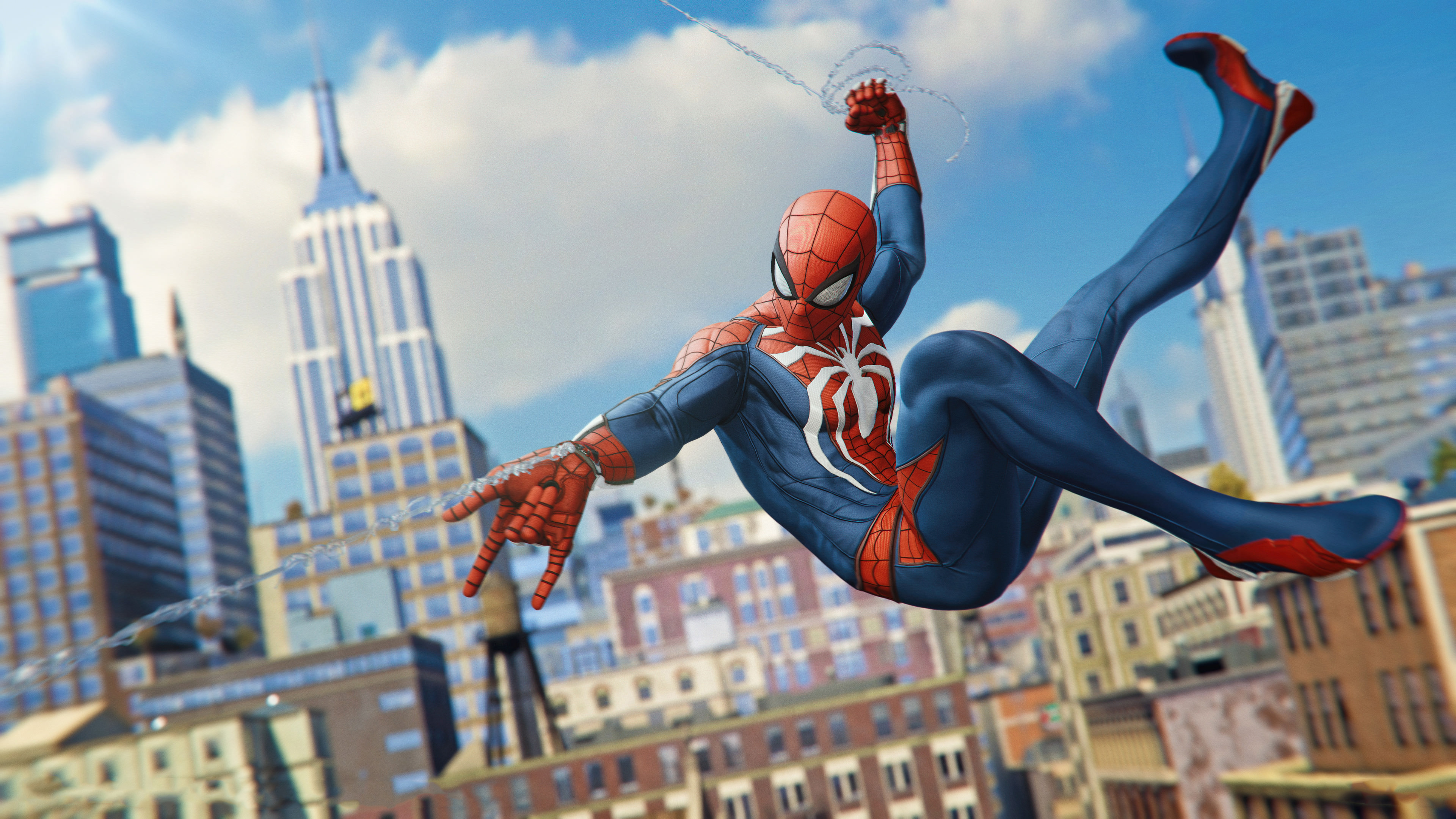 Spider-Man swinging through New York City HD Wallpaper