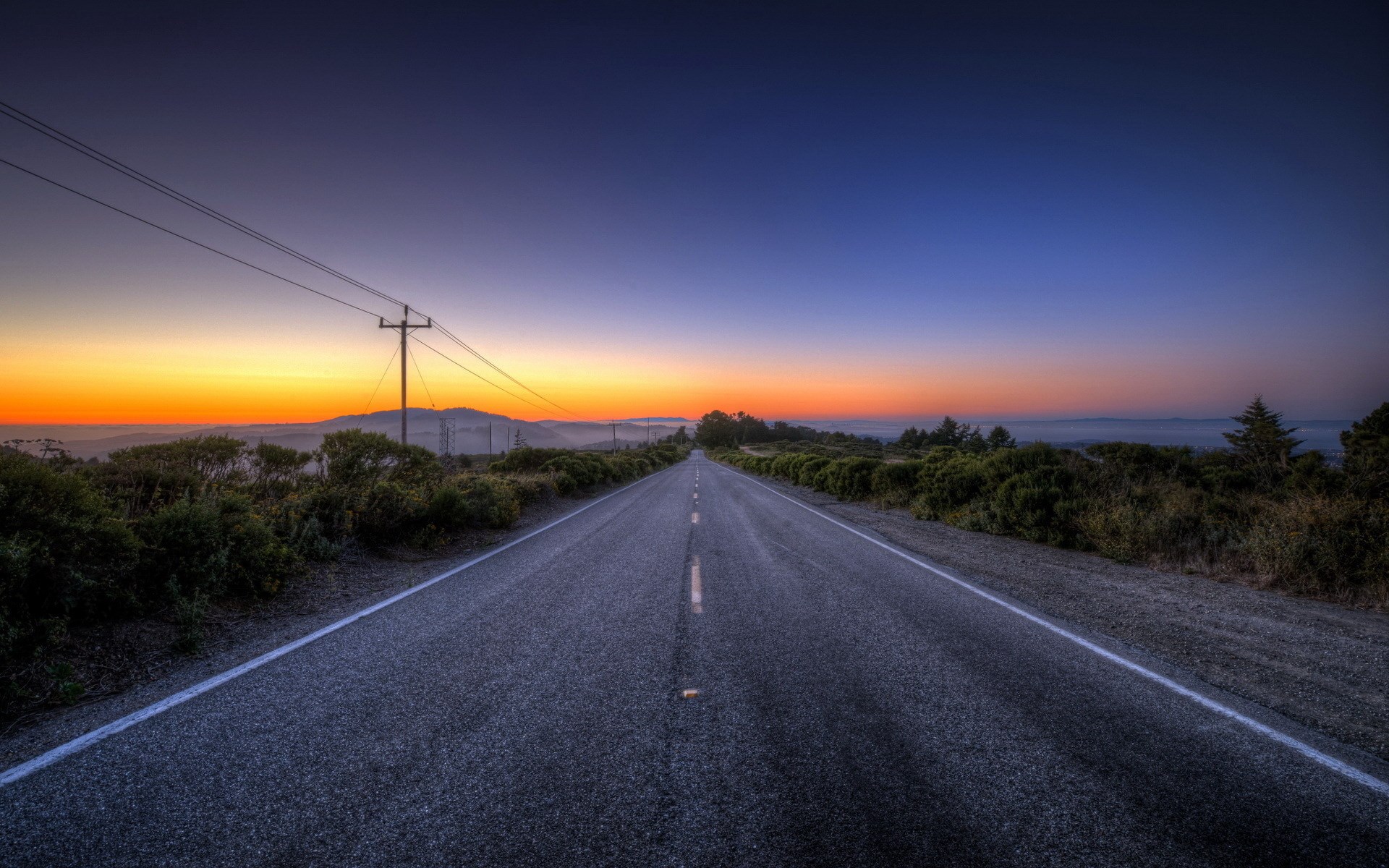 Empty road at sunset with power lines HD Wallpaper