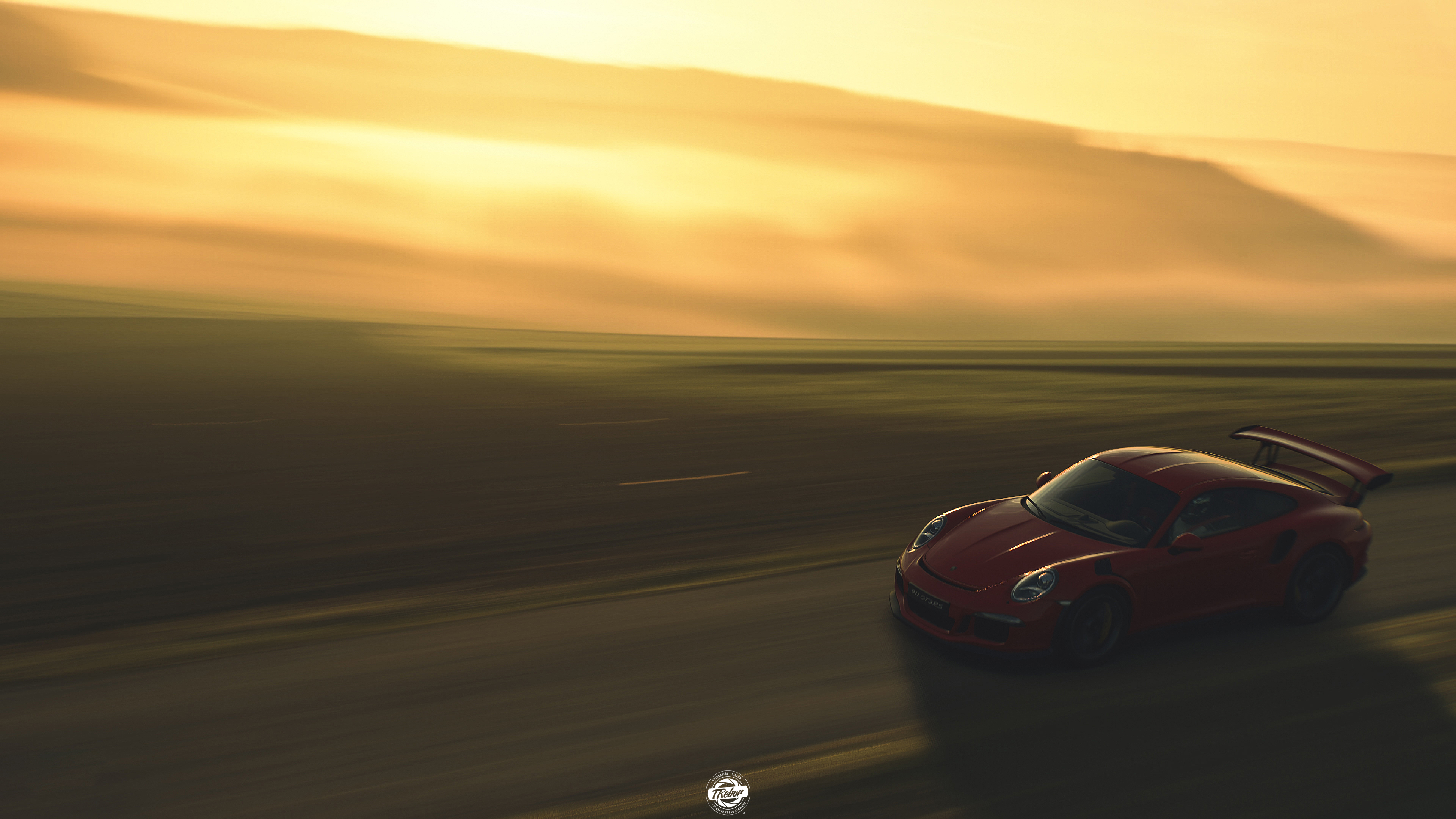 Red Porsche 911 GT3 R driving on a road at sunset HD Wallpaper