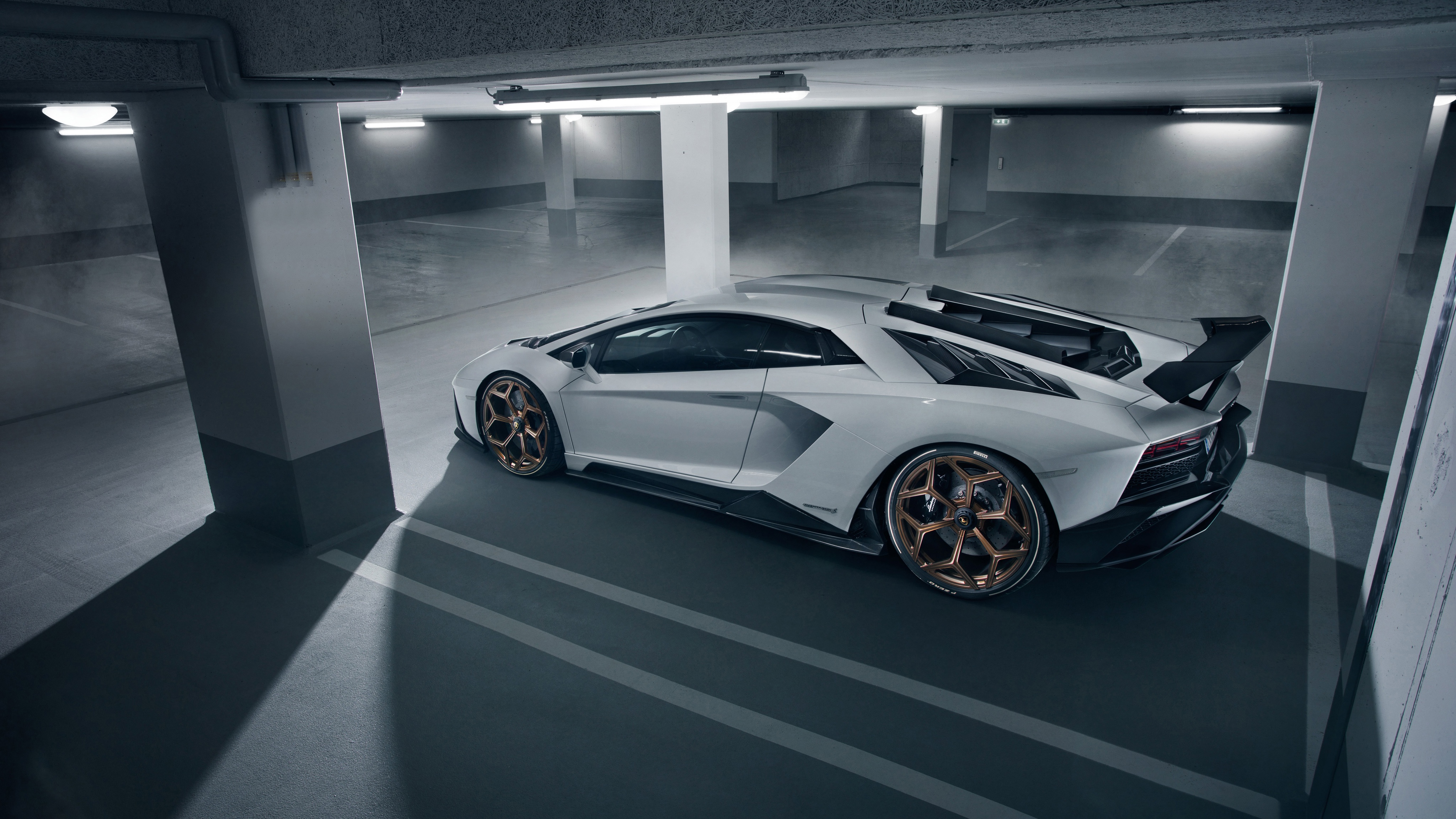 White Novitec Lamborghini Aventador in parking garage HD Wallpaper