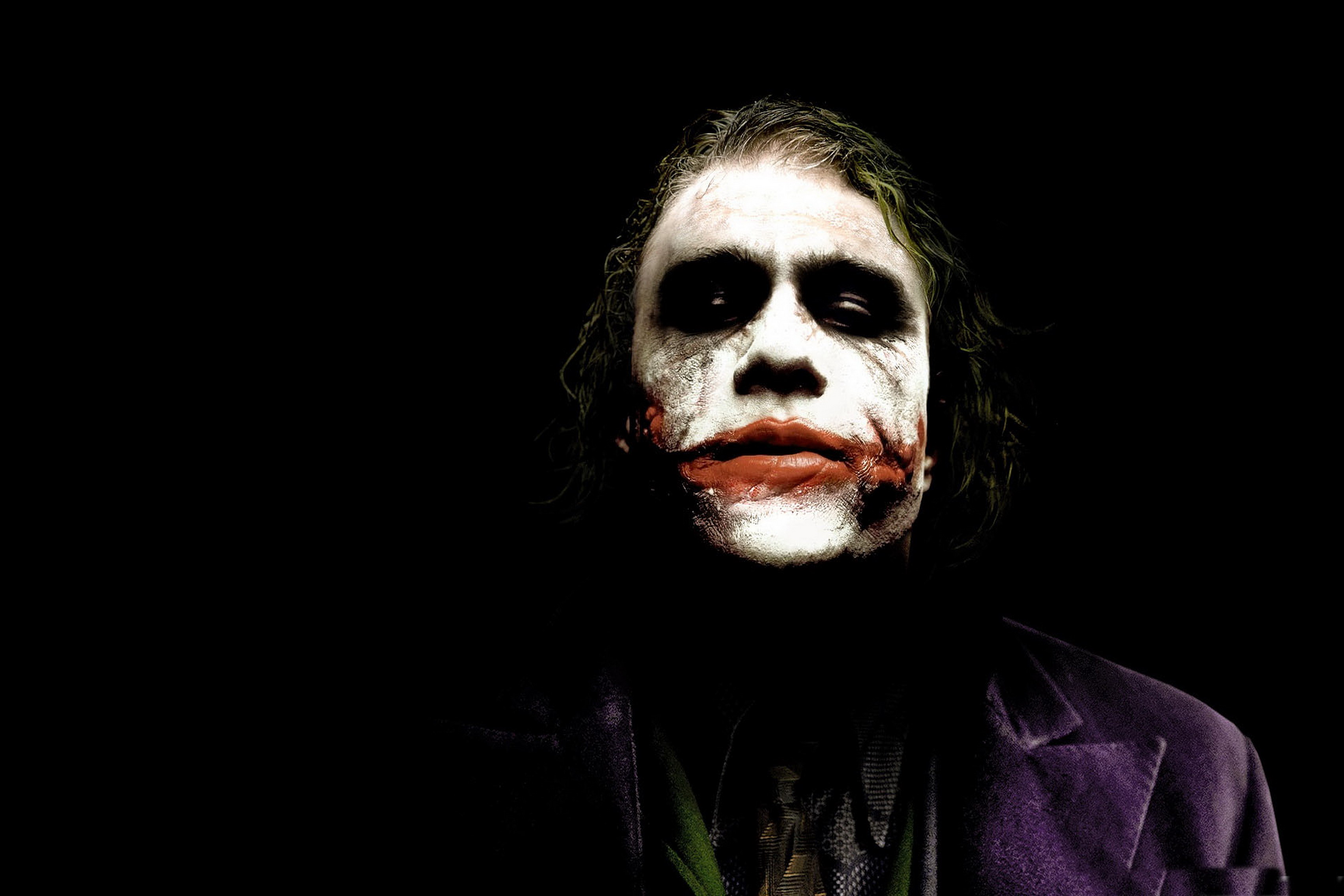 Joker in purple suit 4K HD Wallpaper