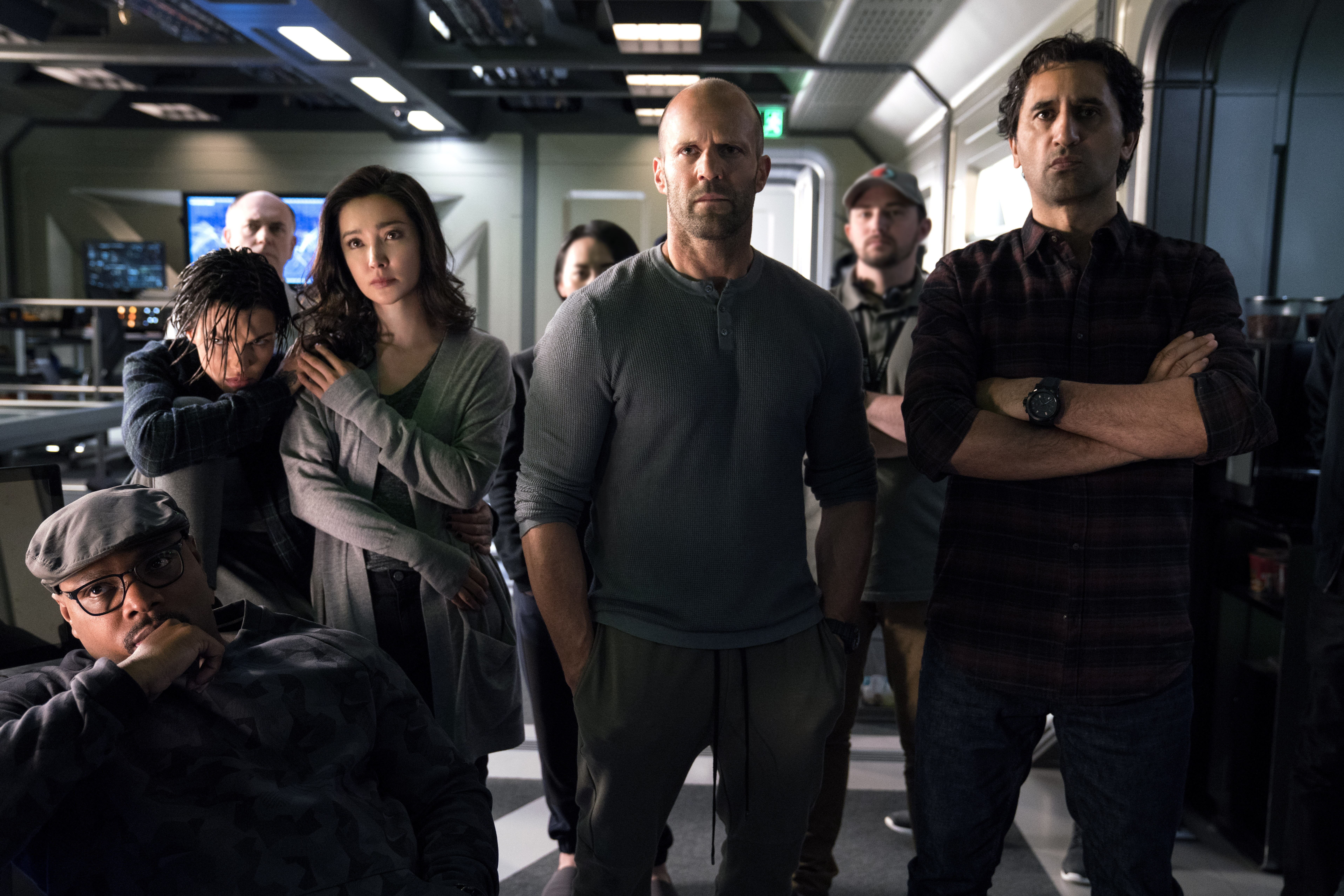 The Meg Cast in a Ship Corridor HD Wallpaper
