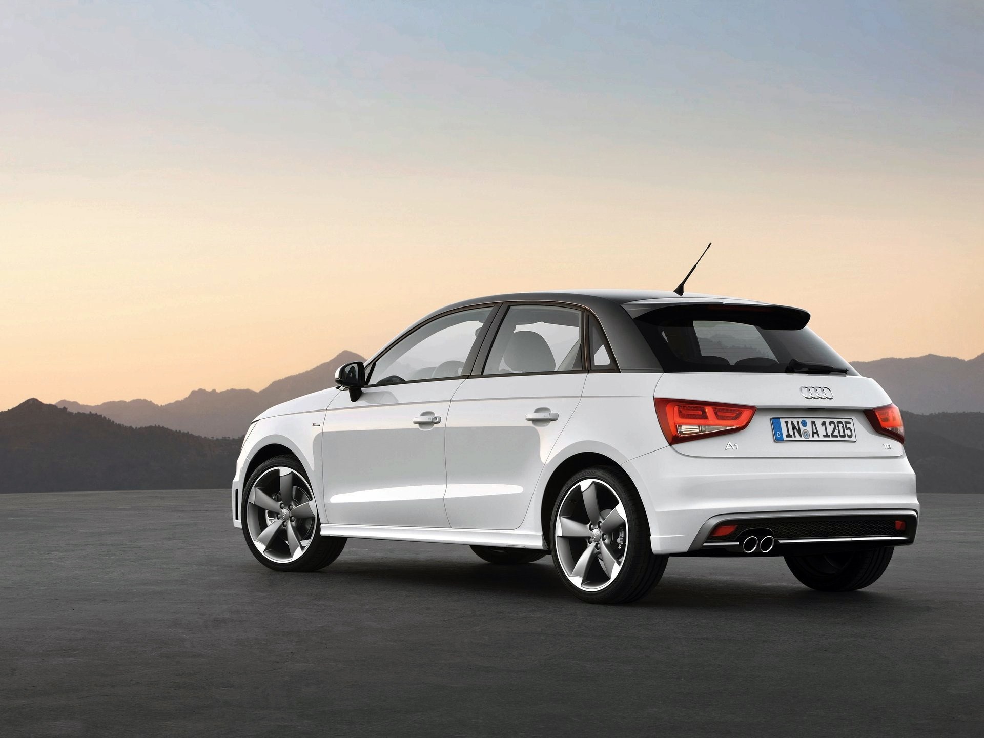 White Audi A1 Quattro with Mountains in Background HD Wallpaper