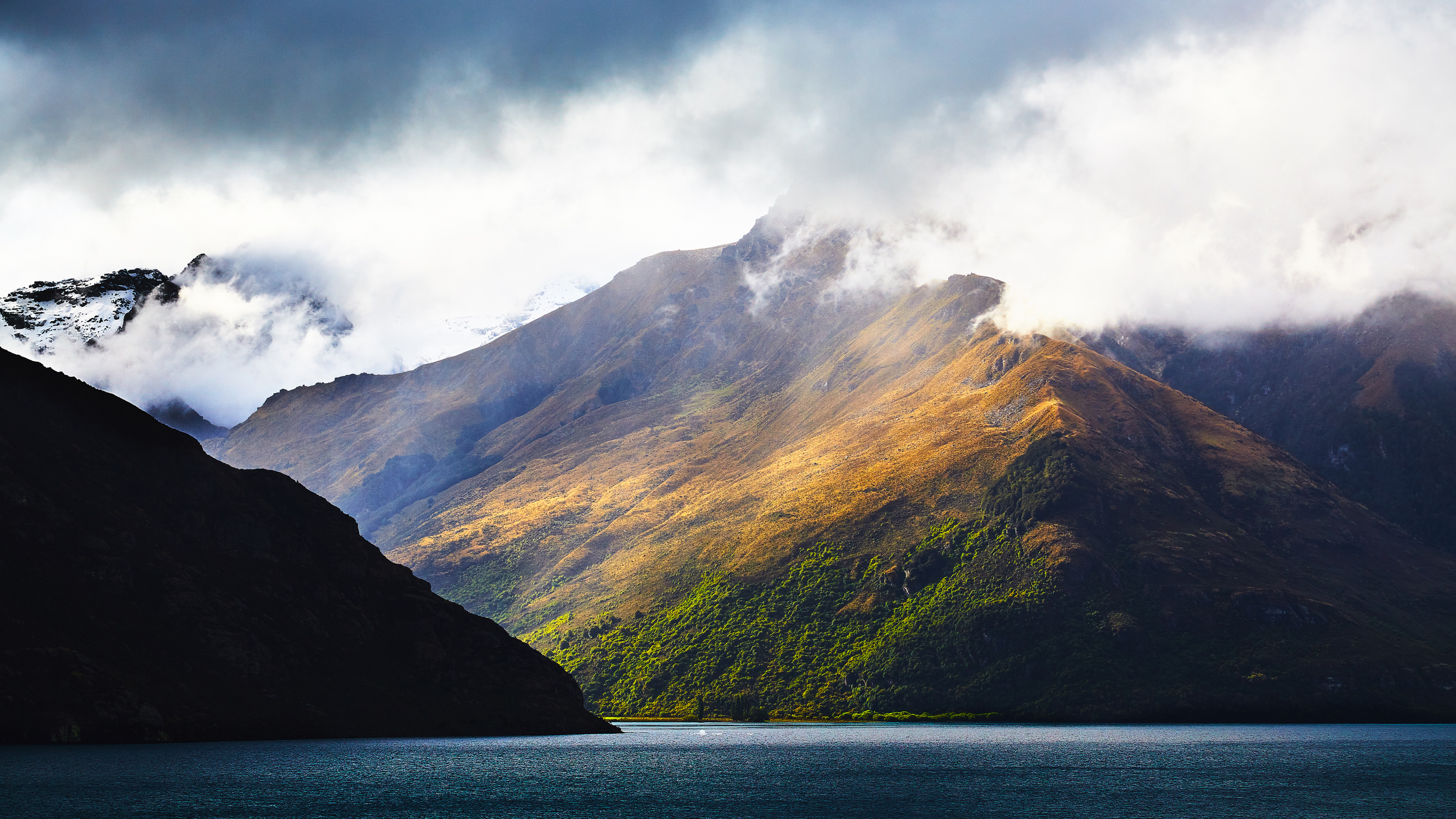 Mountains and lake under dramatic clouds 4K HD Wallpaper