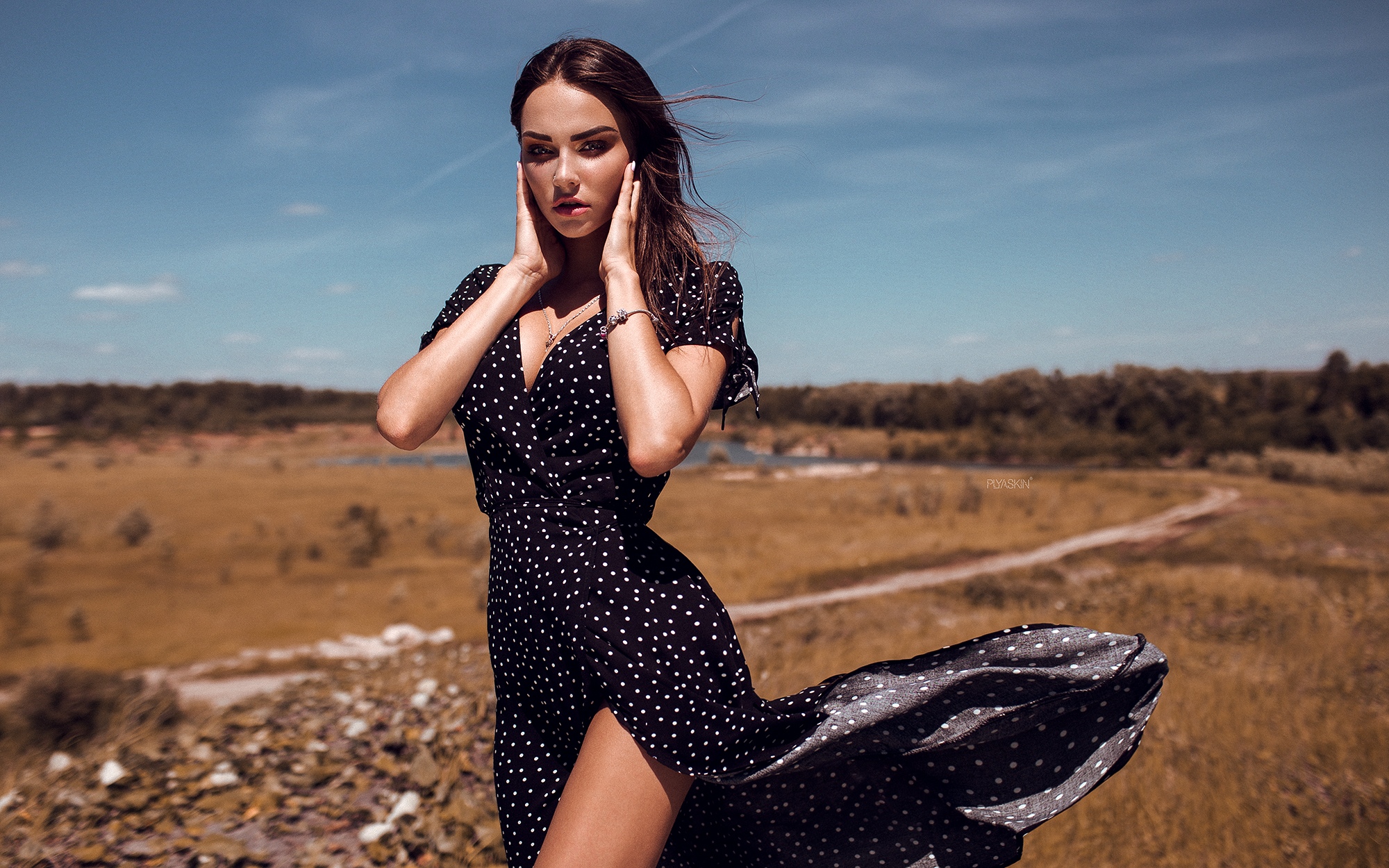 Model in a polka dot dress outdoors HD Wallpaper