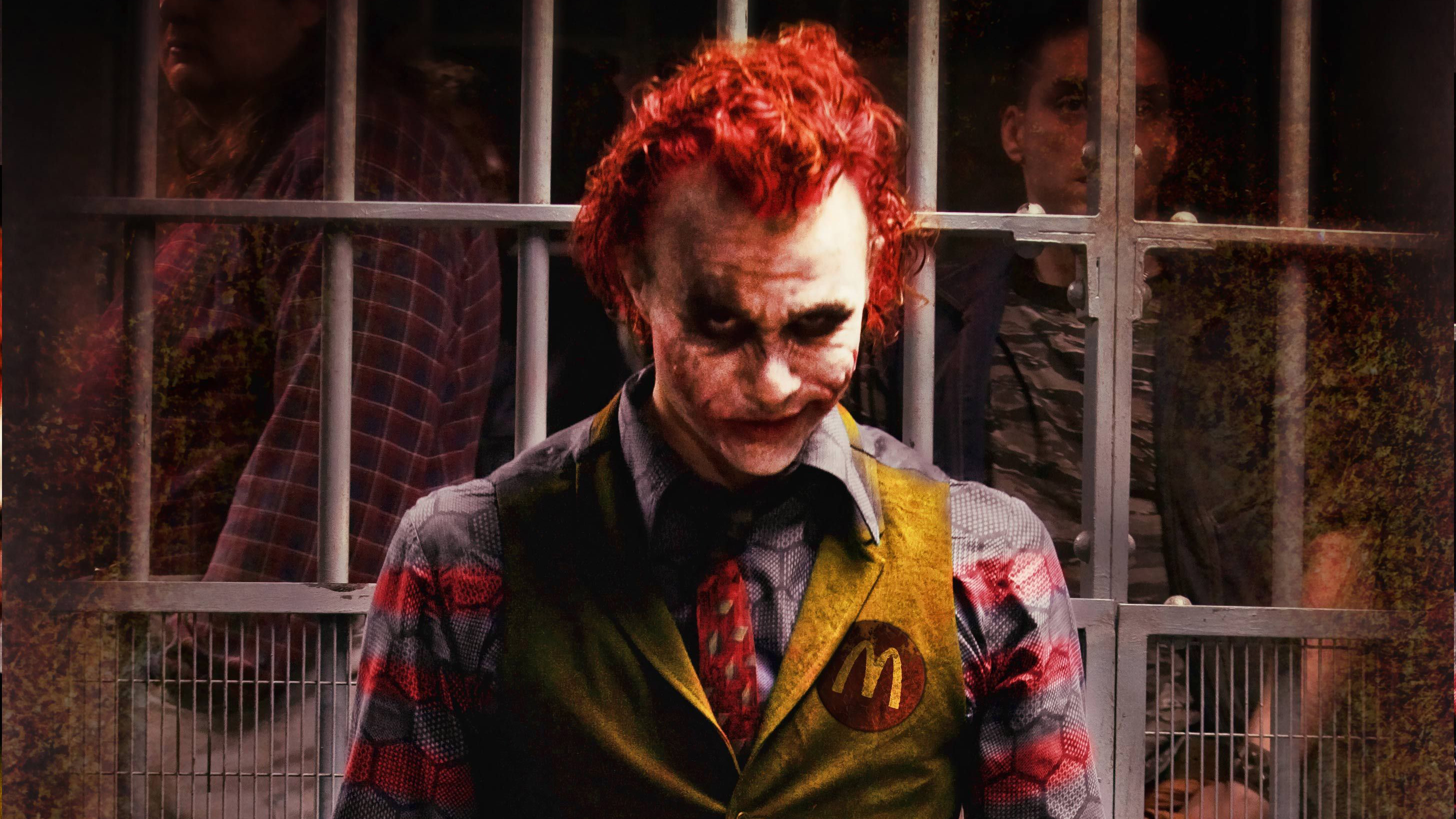 The Joker in a McDonald's uniform in jail HD Wallpaper