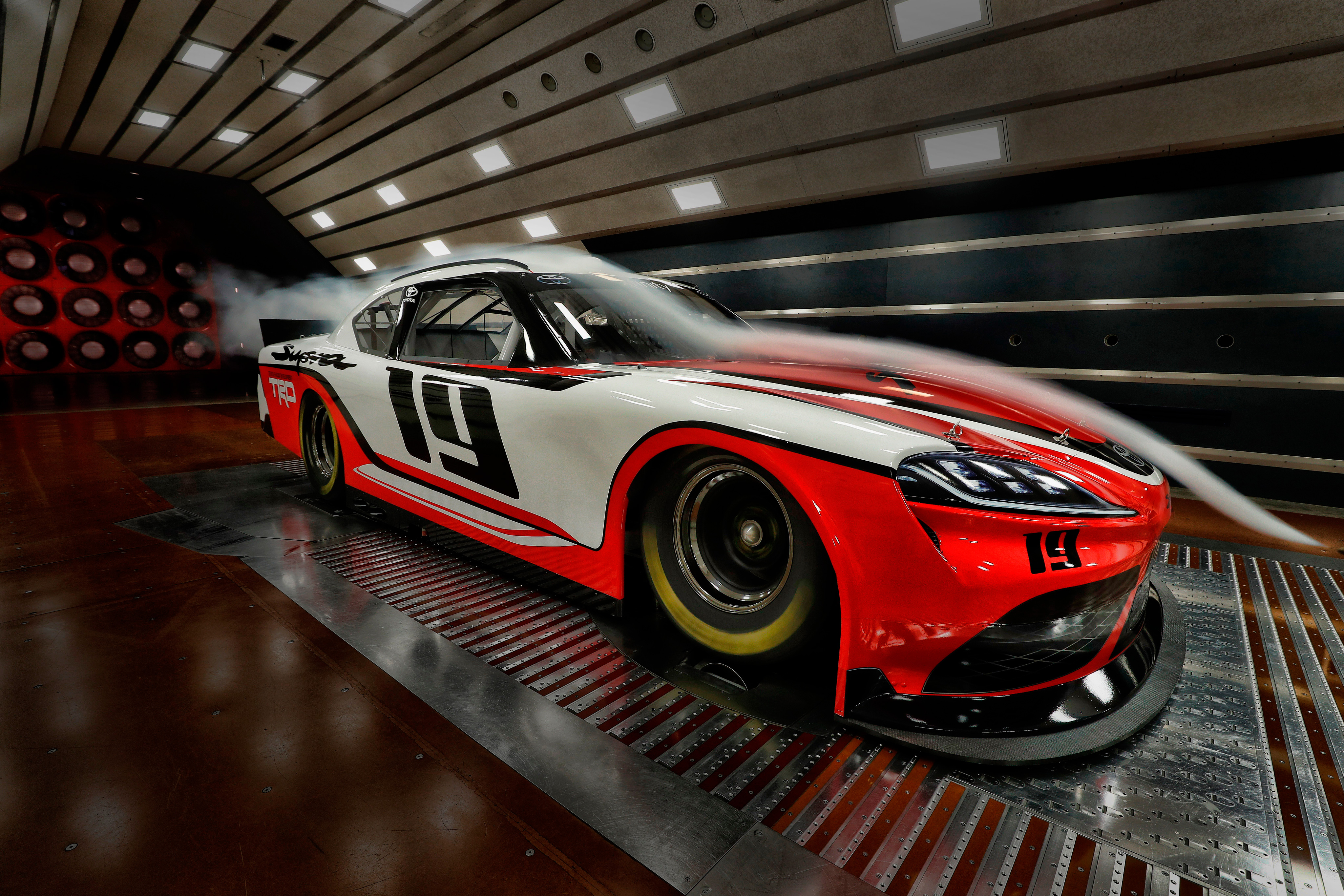Toyota Supra Xfinity race car in wind tunnel HD Wallpaper