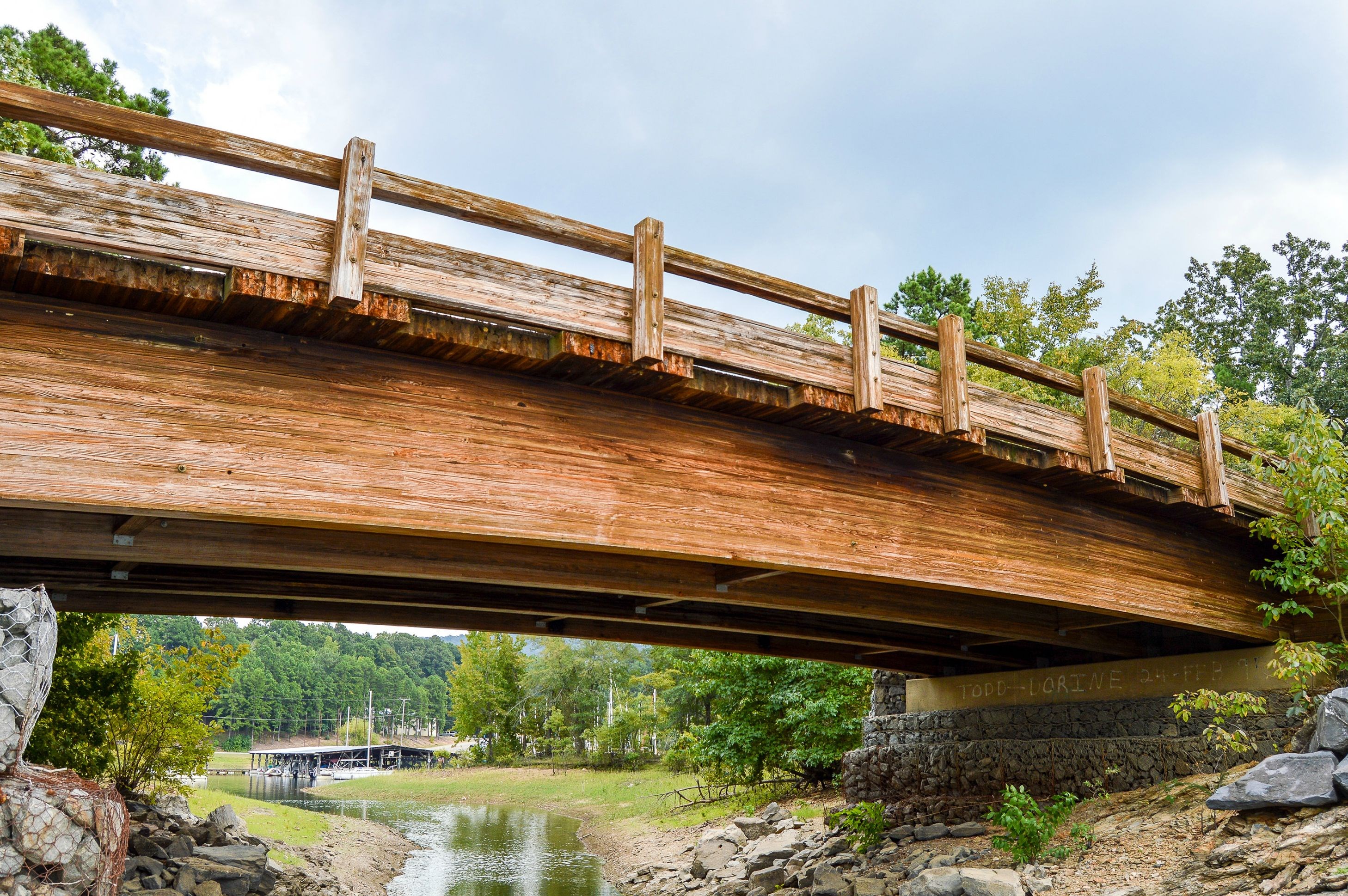 Wooden bridge over a dry creek bed HD Wallpaper