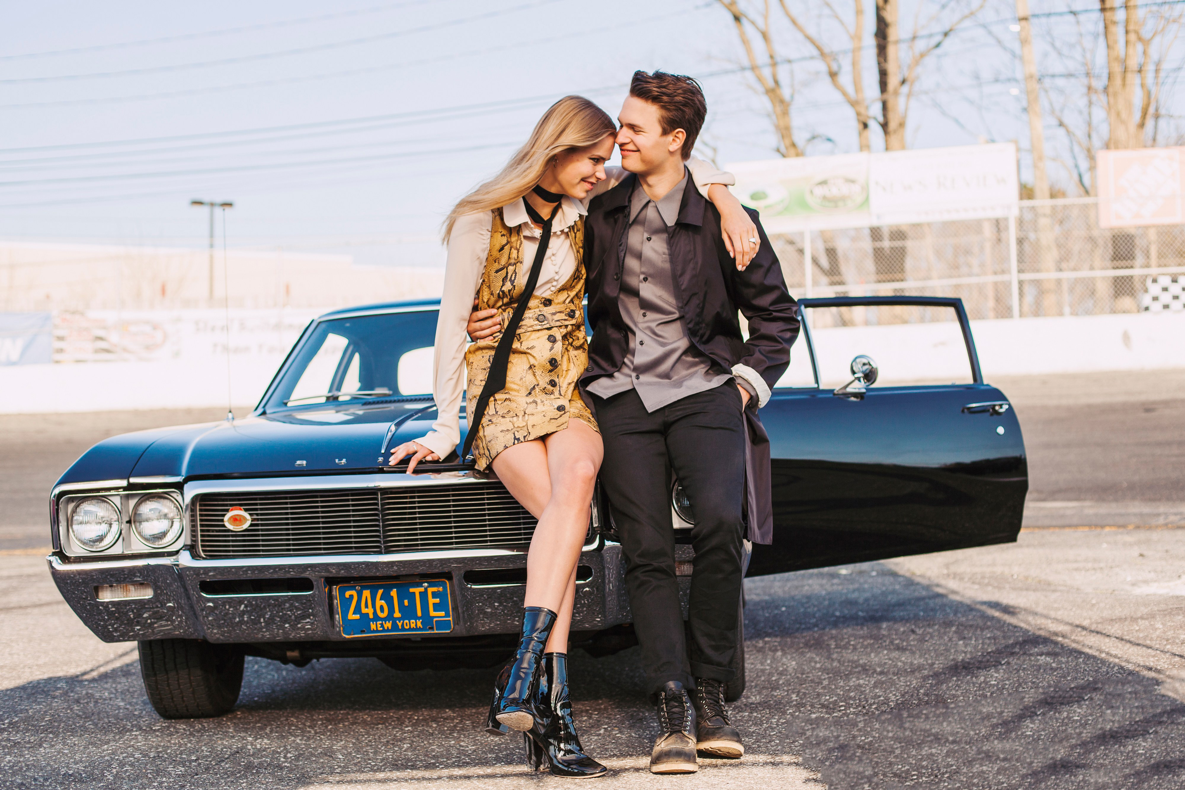 Ansel Elgort and girlfriend by vintage car HD Wallpaper