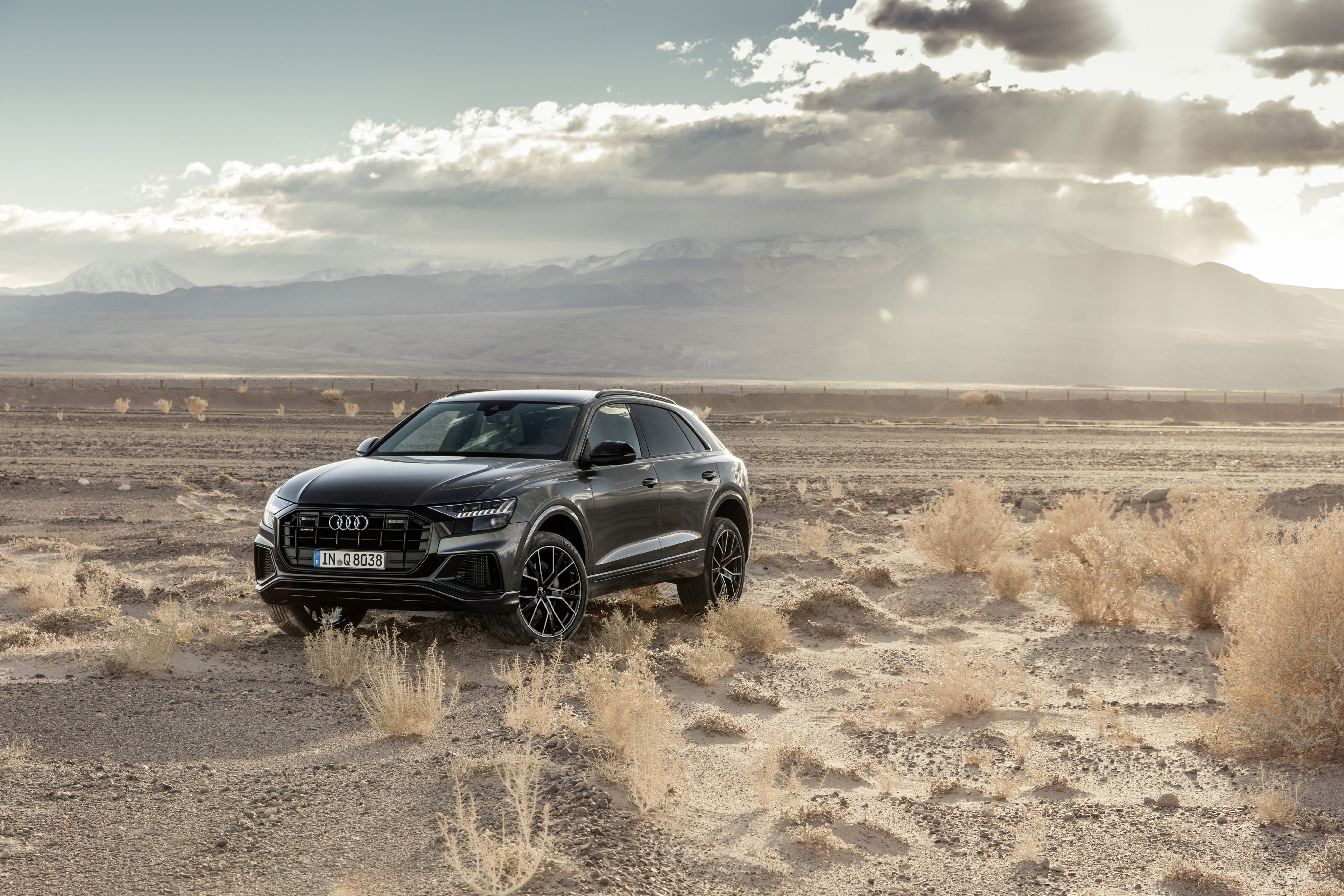 Audi Q8 in a desert landscape HD Wallpaper