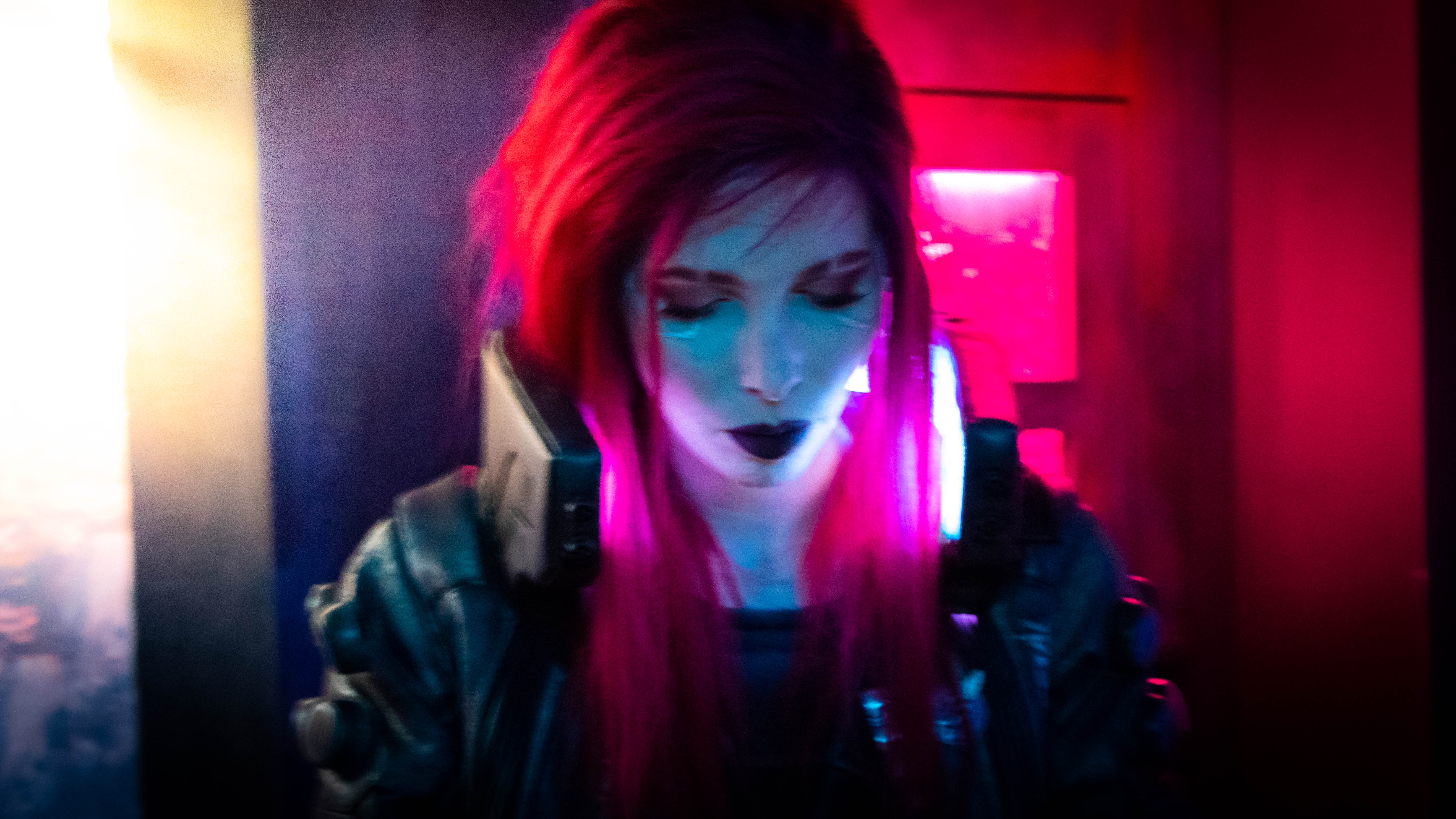 Cyberpunk 2077 character with pink hair and glowing lights HD Wallpaper