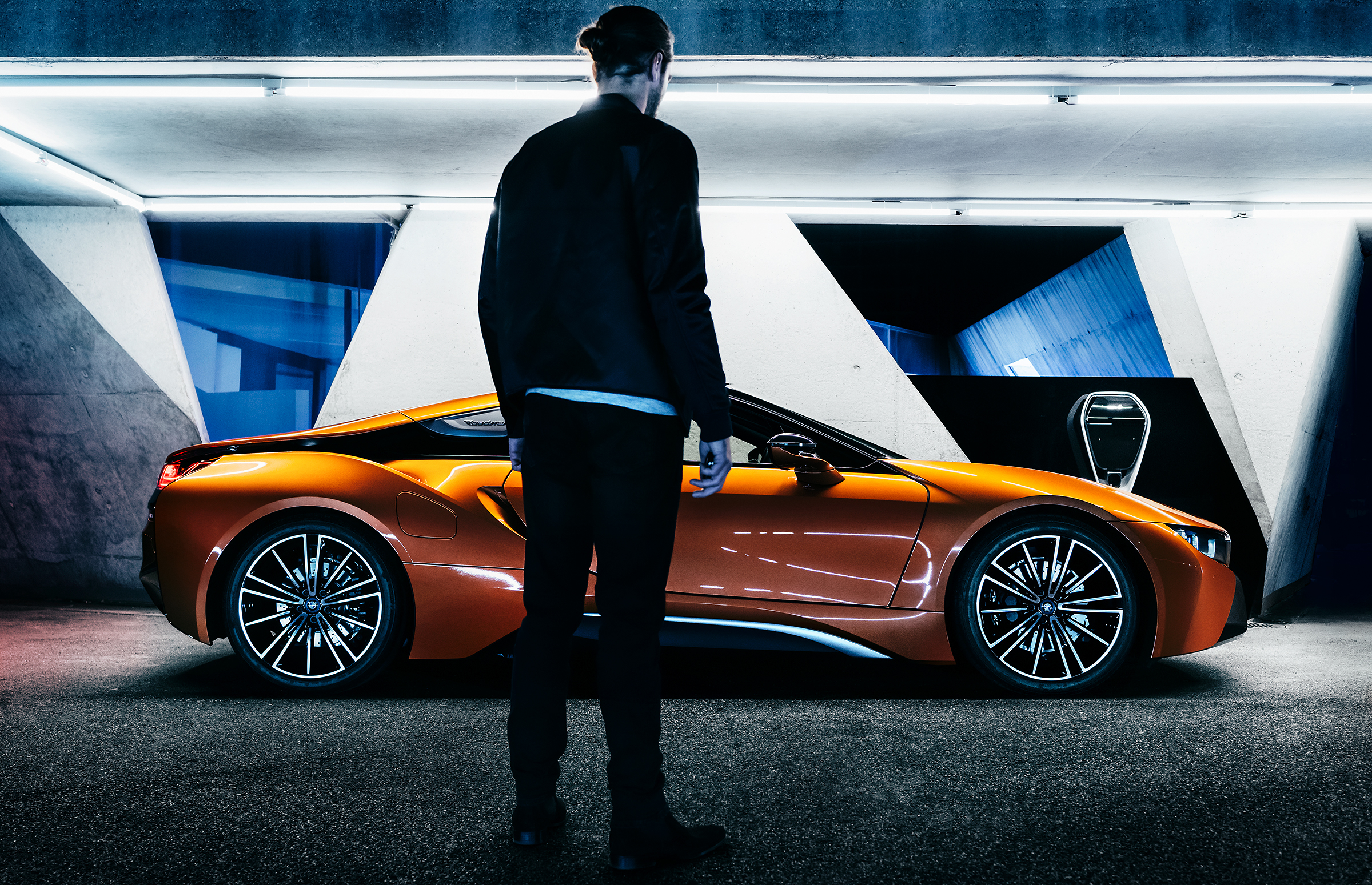 BMW i8 parked with a man standing nearby HD Wallpaper