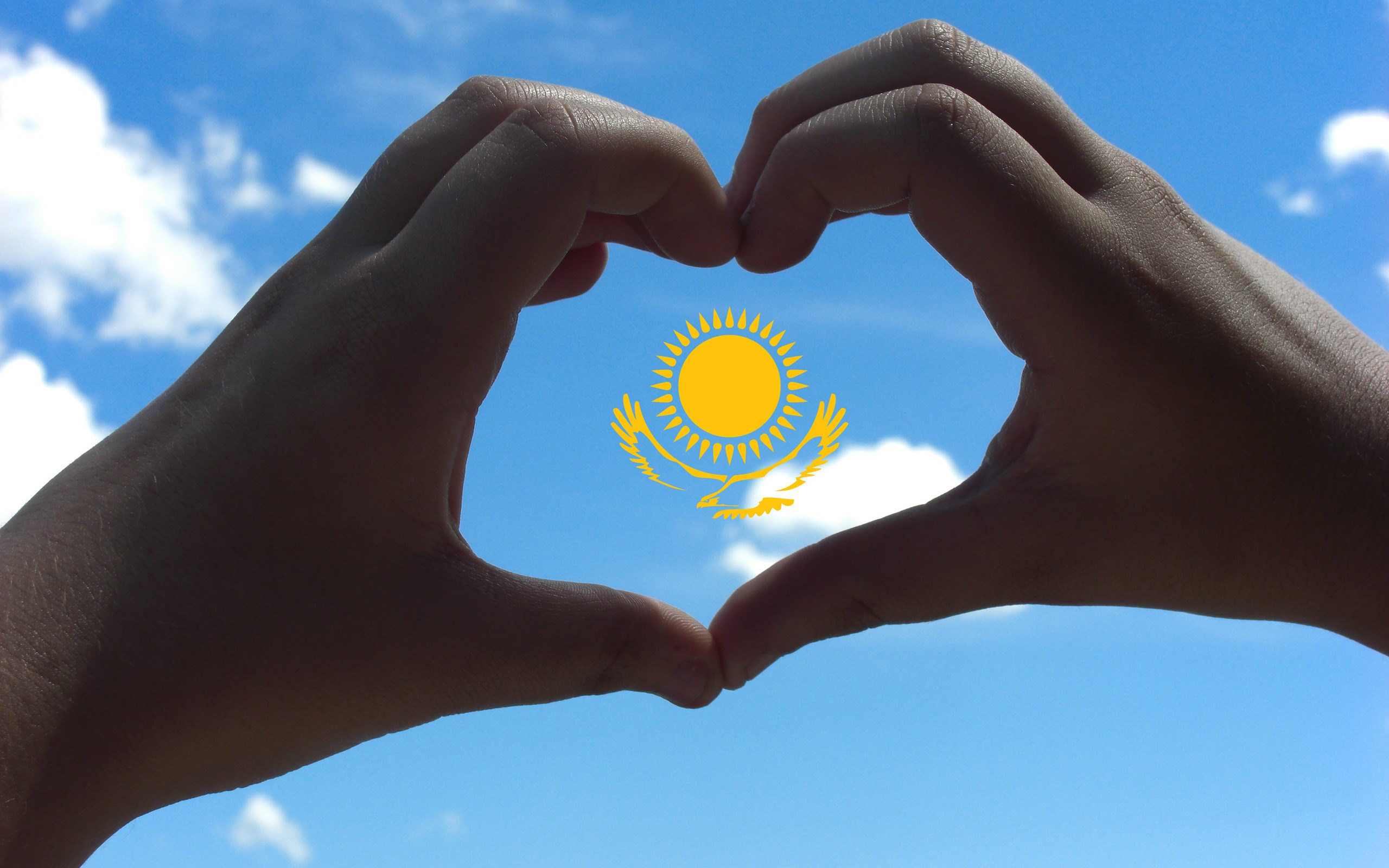 Kazakhstan flag in heart shape hands HD Wallpaper