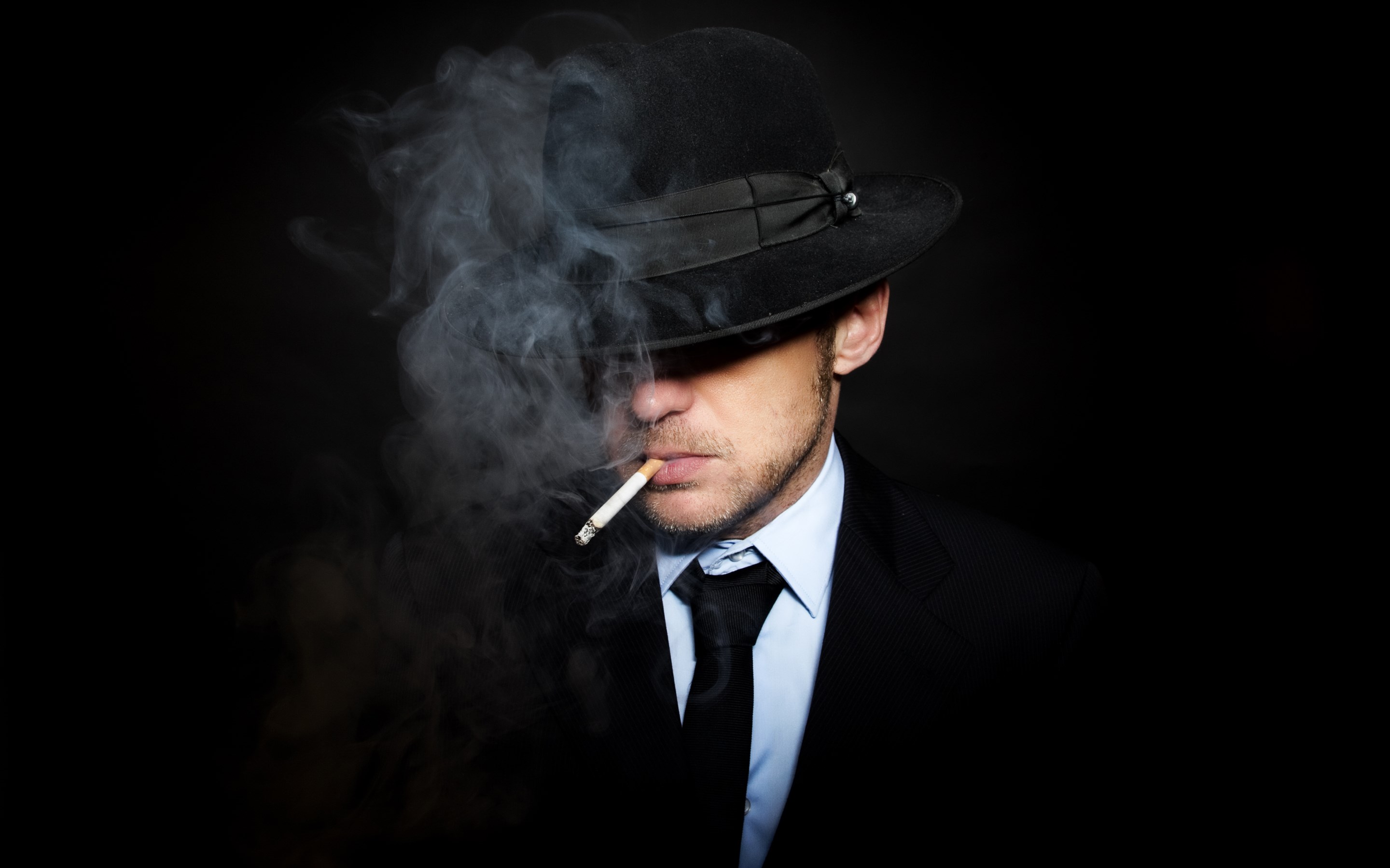Man in fedora smoking a cigarette HD Wallpaper