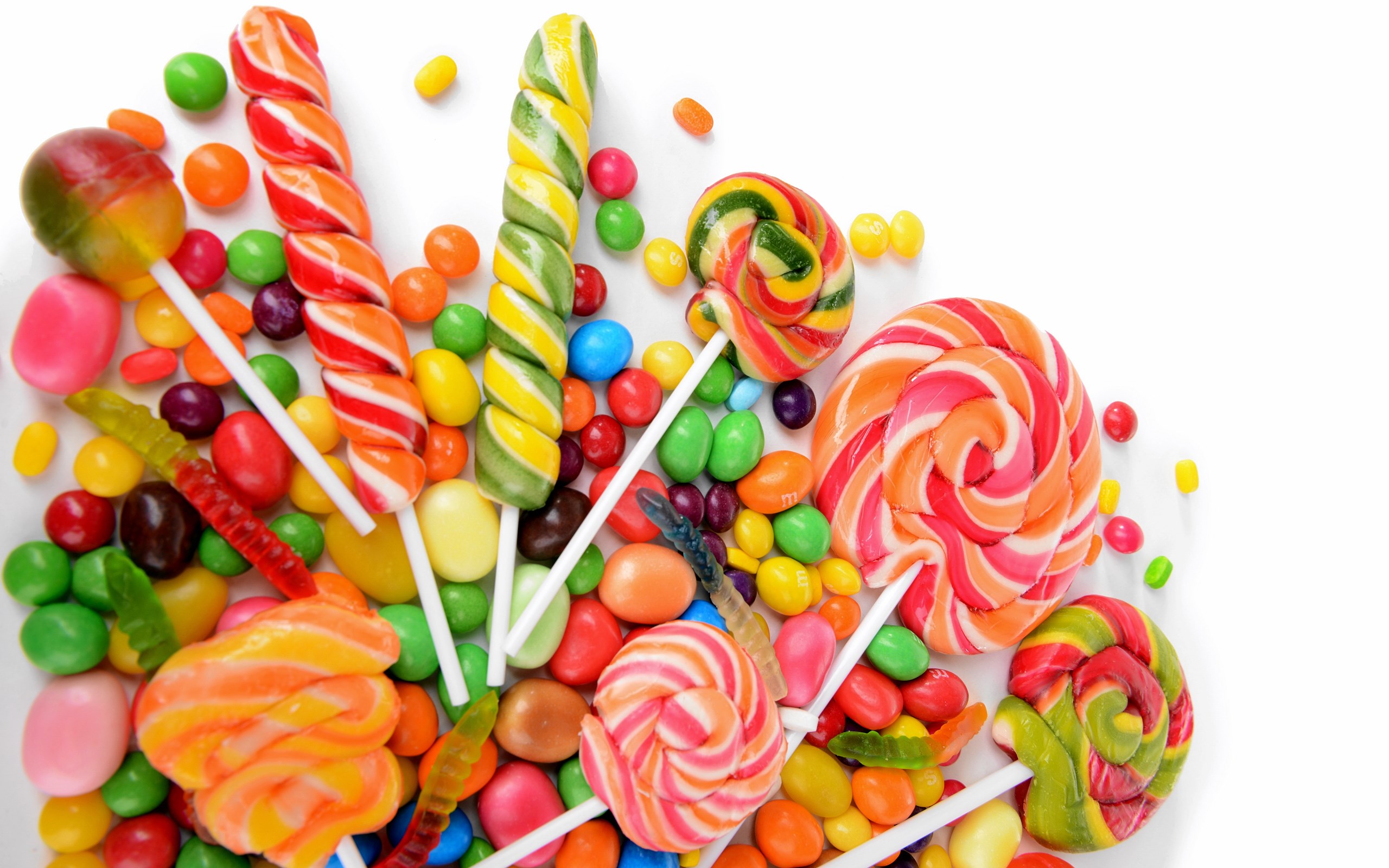 Assortment of colorful candies and lollipops HD Wallpaper