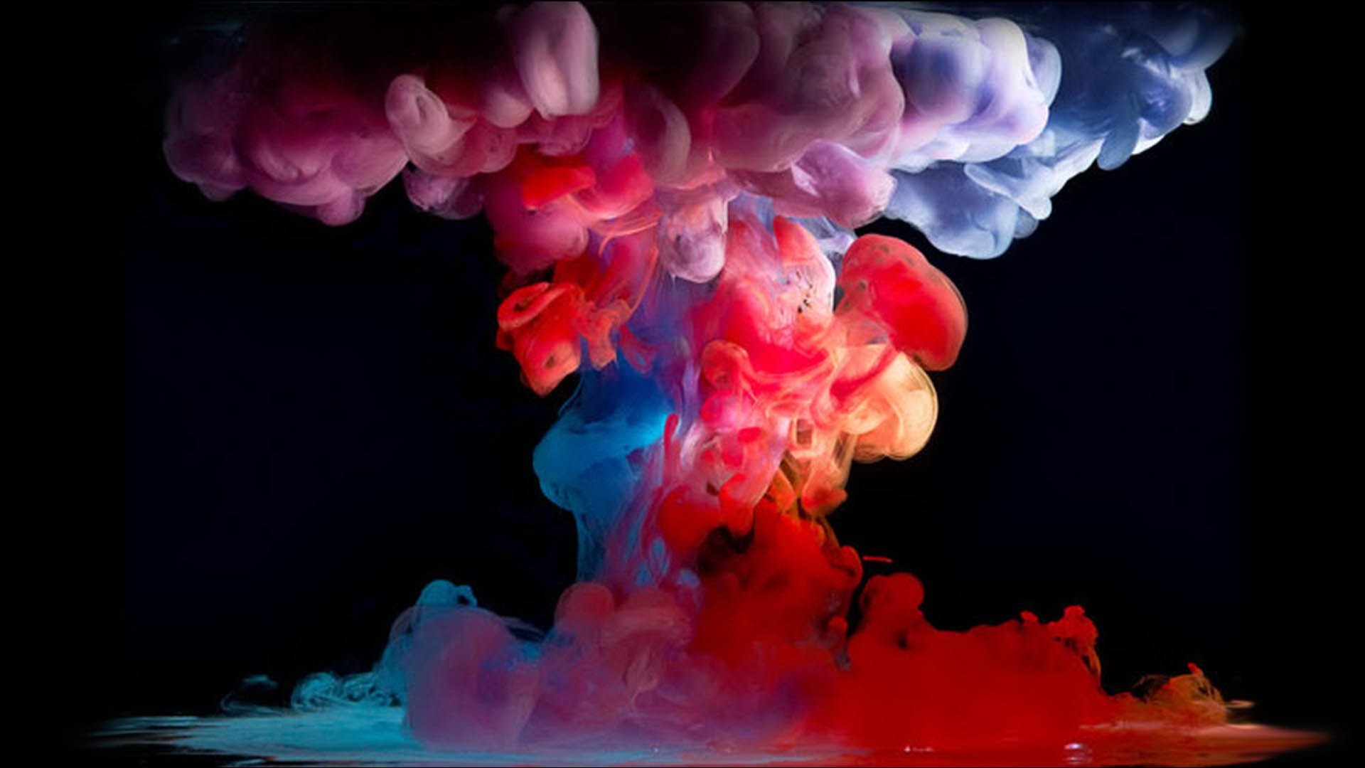 Colorful smoke explosion on black background HD Wallpaper